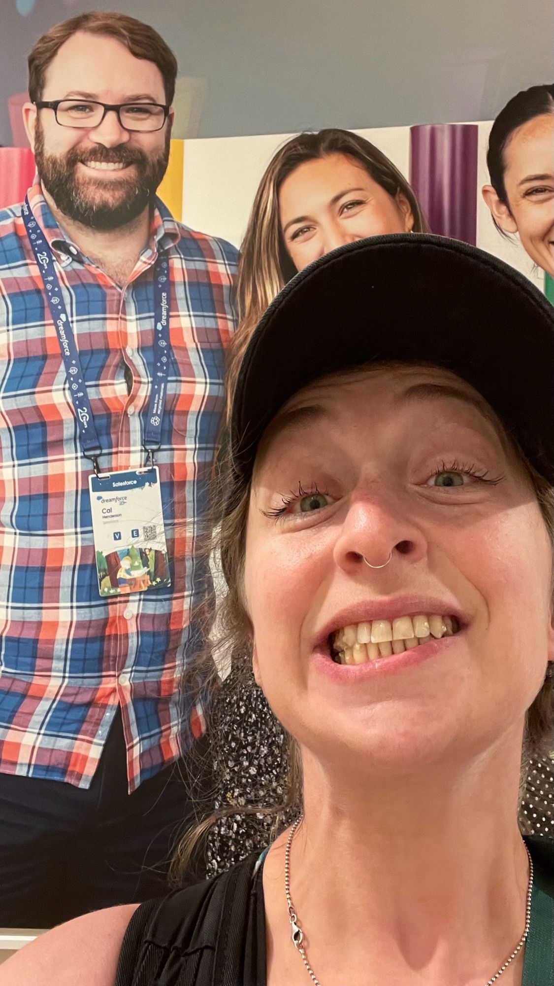 Selfie in front of a poster of Cal Henderson