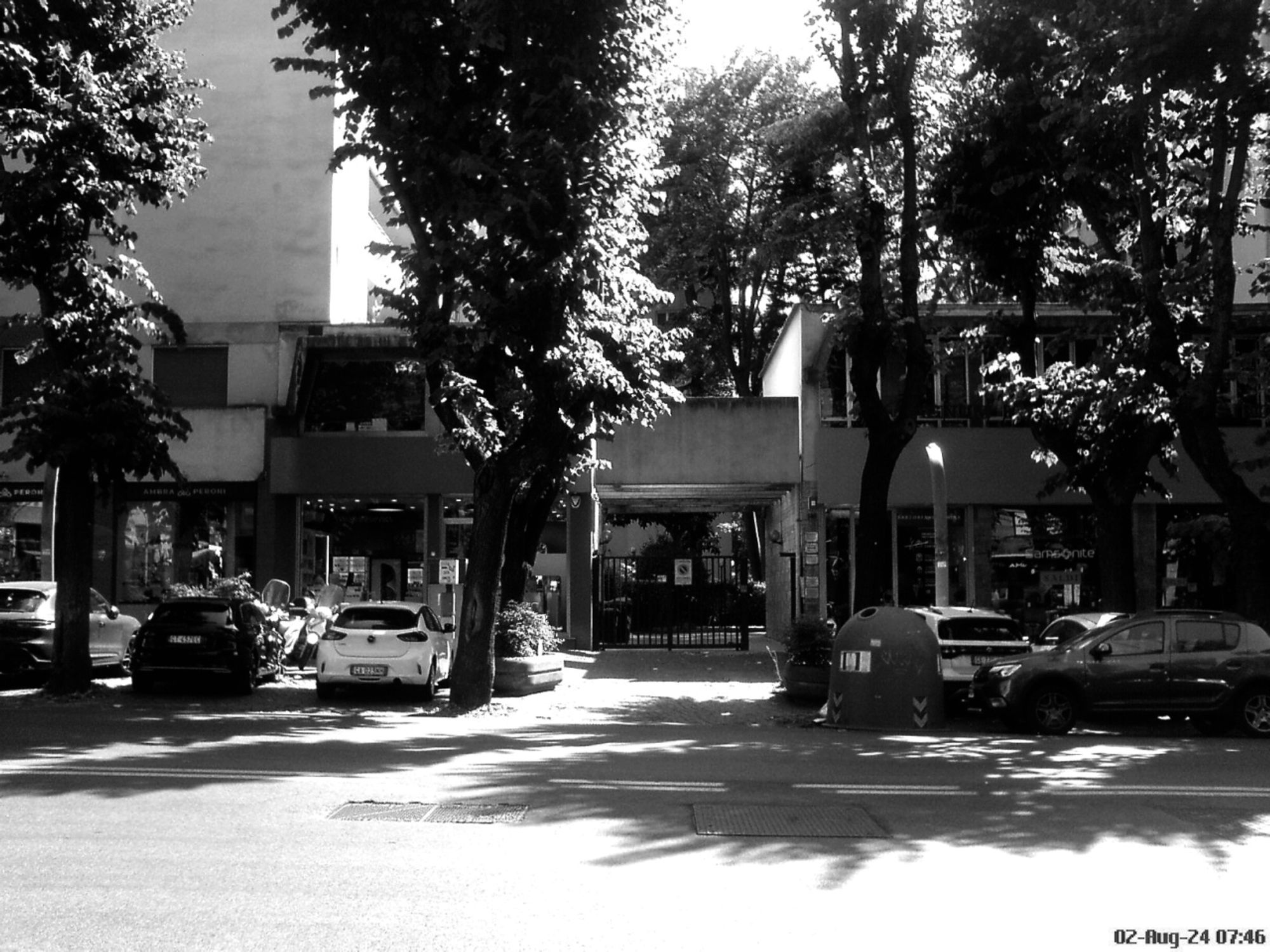 The streets of Rome - high-contrast light and shadow monochrome based on a photo from a 2006 Sony Ericsson W810i cell phone