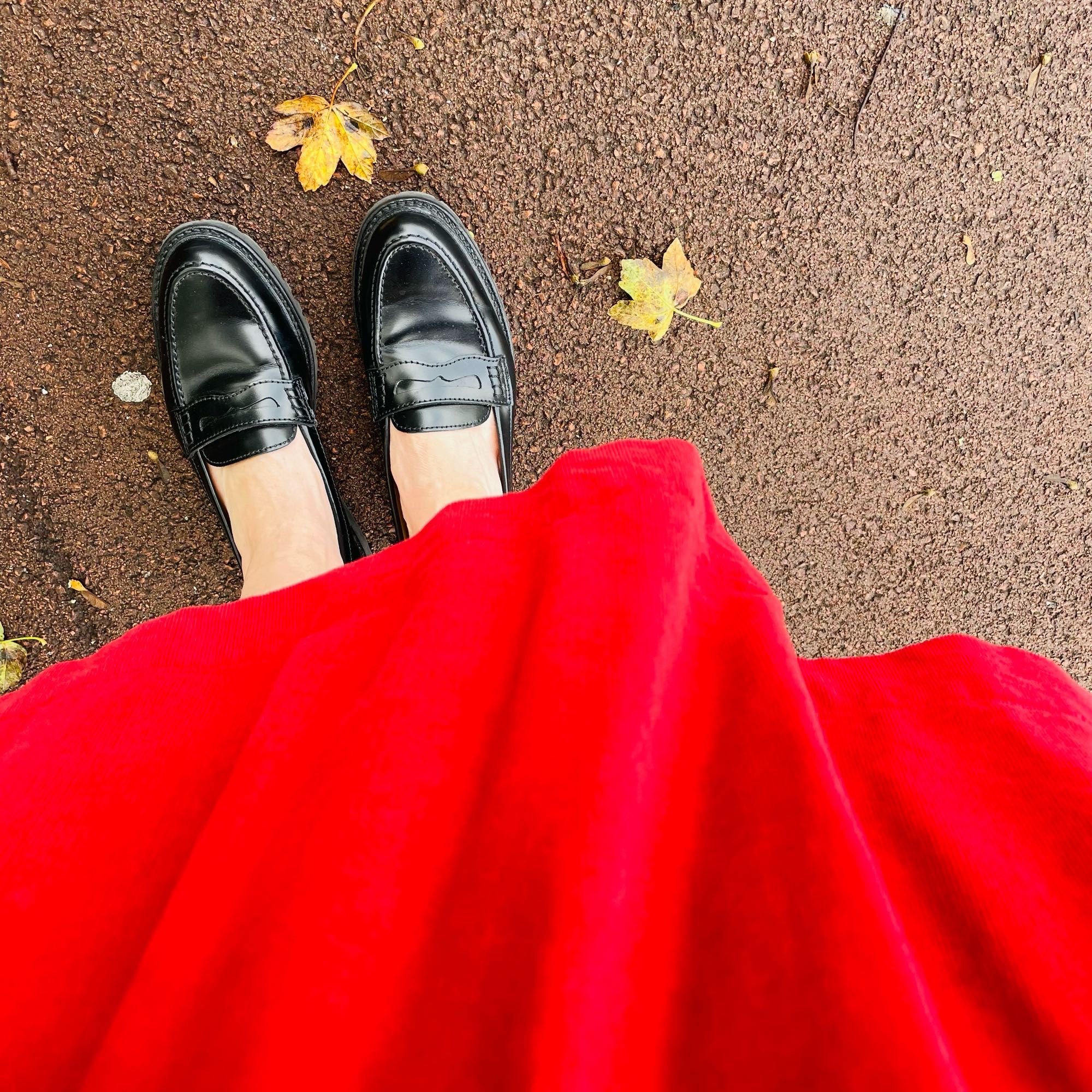 Photo of my red dress and shiny black shoes