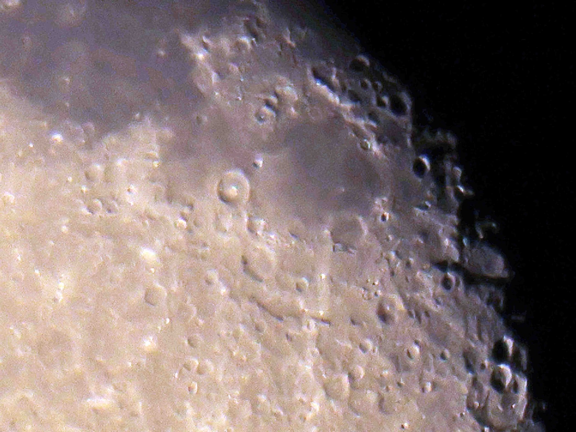 Detail of the center/right of the waning gibbous moon. Deep shadows on some of the ridge lines. I also love how some of the craters look like they're frozen as a rock hitting water, a little dot in the middle surrounded by a circle.