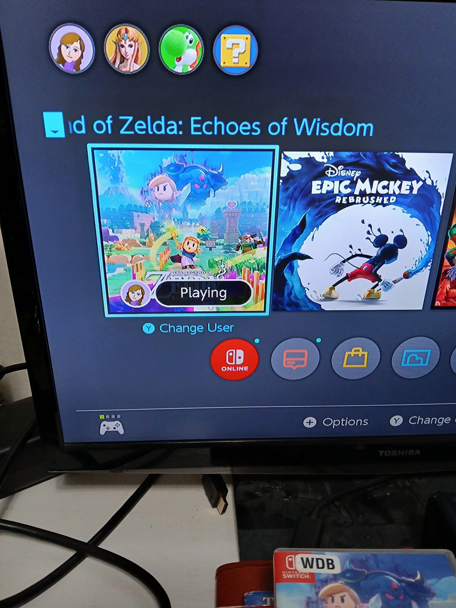 The Nintendo Switch system home screen. "The Legend of Zelda: Echoes of Wisdom" is selected and listed as "Playing".