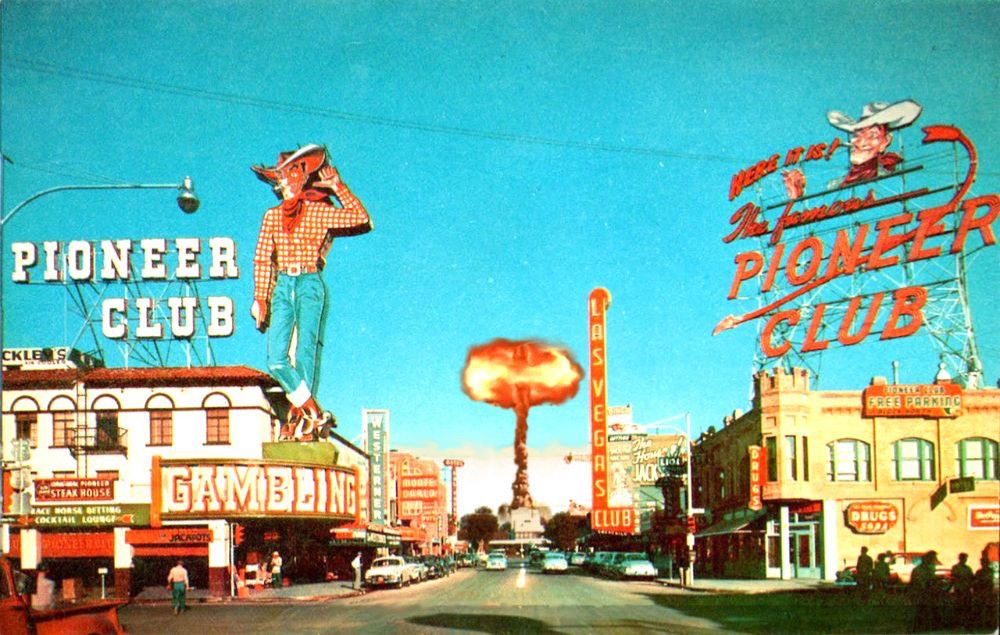 A picture of Las Vegas ca. 1951. A mushroom cloud can be seen in the distance at the end of Fremont Street.