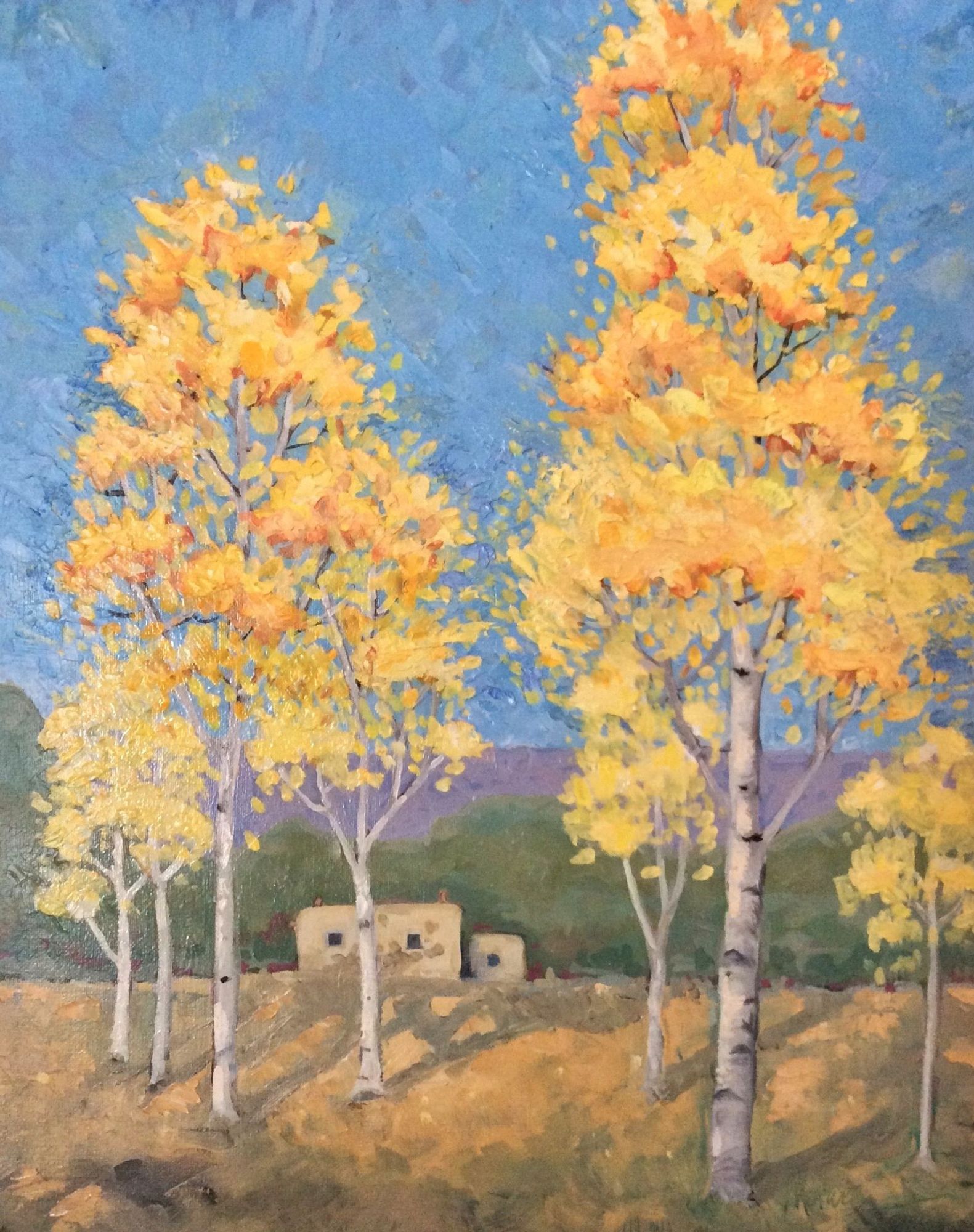 Oil painting of a small grove of aspen trees that have turned gold, with an adobe house in the middle ground, purple foothills, and green trees.