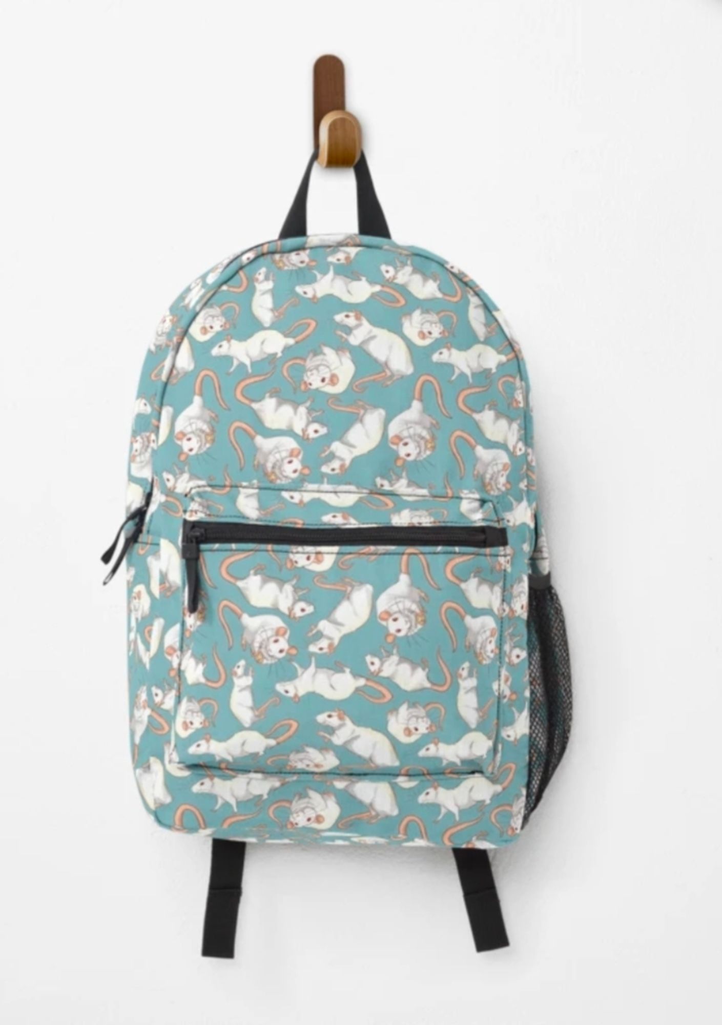 Blue backpack with a white lab rat pattern