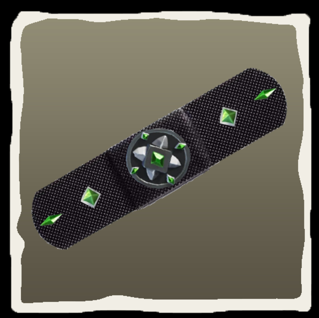 A black bandage adorned with green gem-like decorations. The bandage features a central circular design with a star-like pattern and green gems at the center and around it. Additional green gems are placed on both ends of the bandage, creating a visually striking and unique appearance.