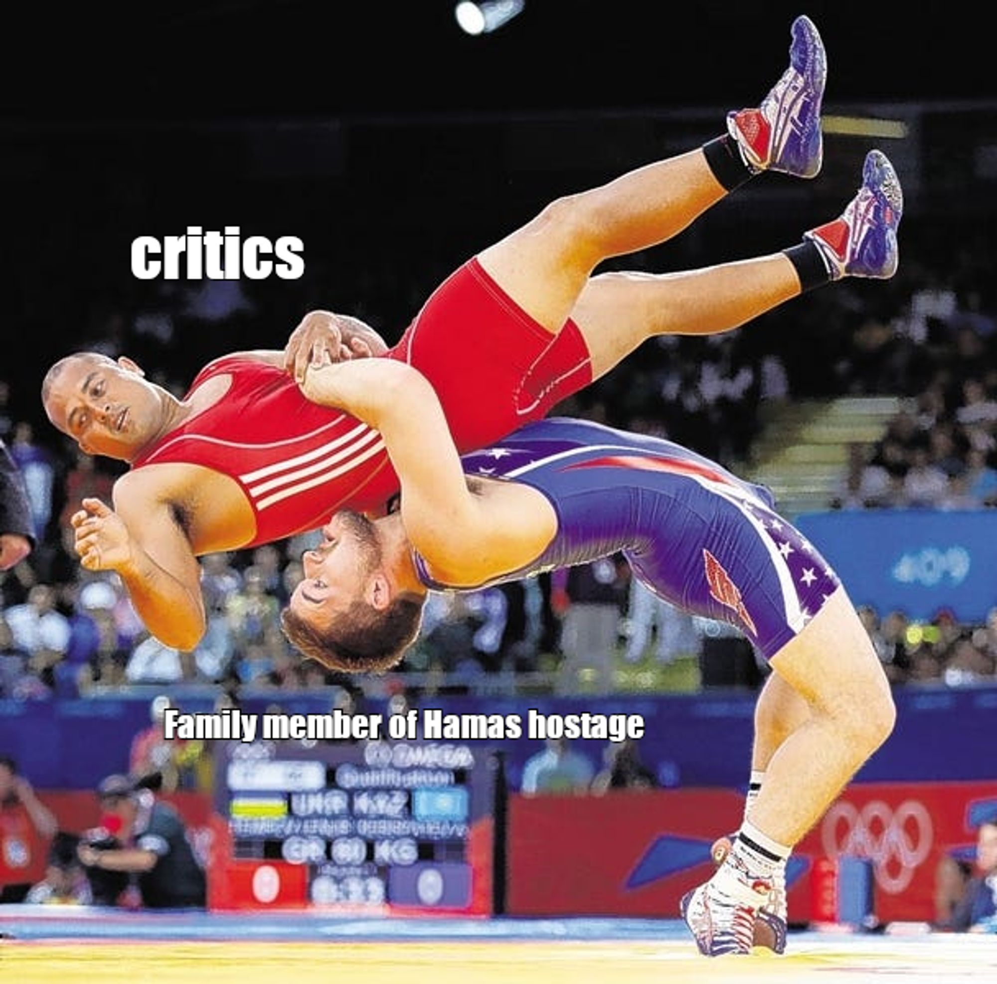 Wrestler body slamming another wrestler.
 The slammer is labeled with Family member of Hamas hostage and the person or thing being slammed is labeled critics.

 image source: https://www.recordonline.com/gcdn/authoring/2013/02/13/NTHR/ghows-TH-f60f5778-c267-4420-9748-eab18bd739db-2114c477.jpeg