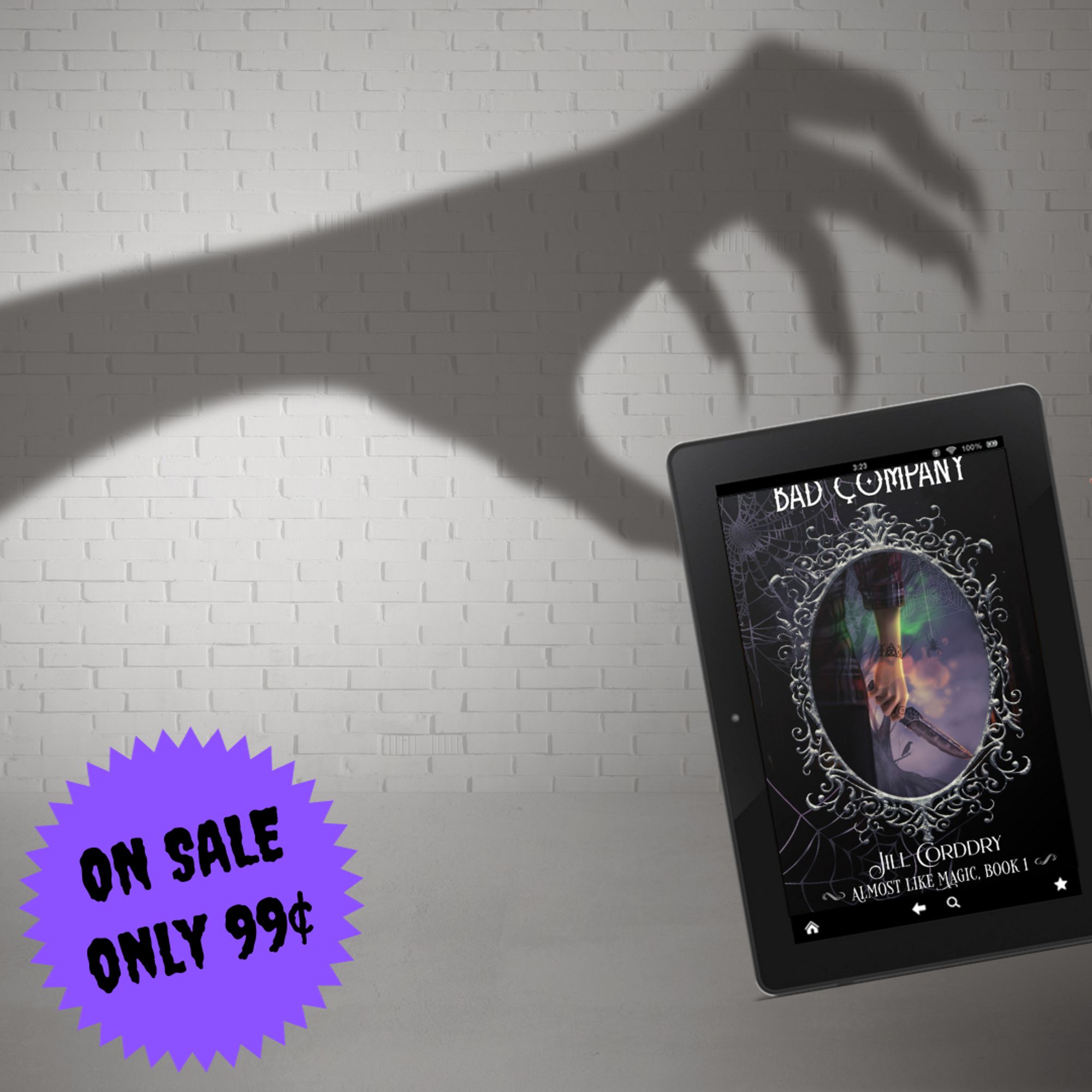 Image has a spooky background, pale gray bricks and a pale gray floor. The shadowy silhouette of a clawed, human-ish hand reaches out from the left. It's reaching for the ebook copy of Bad Company: Almost Like Magic, book 1, by Jill Corddry. A purple sticker in the lower left corner says ON SALE! ONLY 99¢