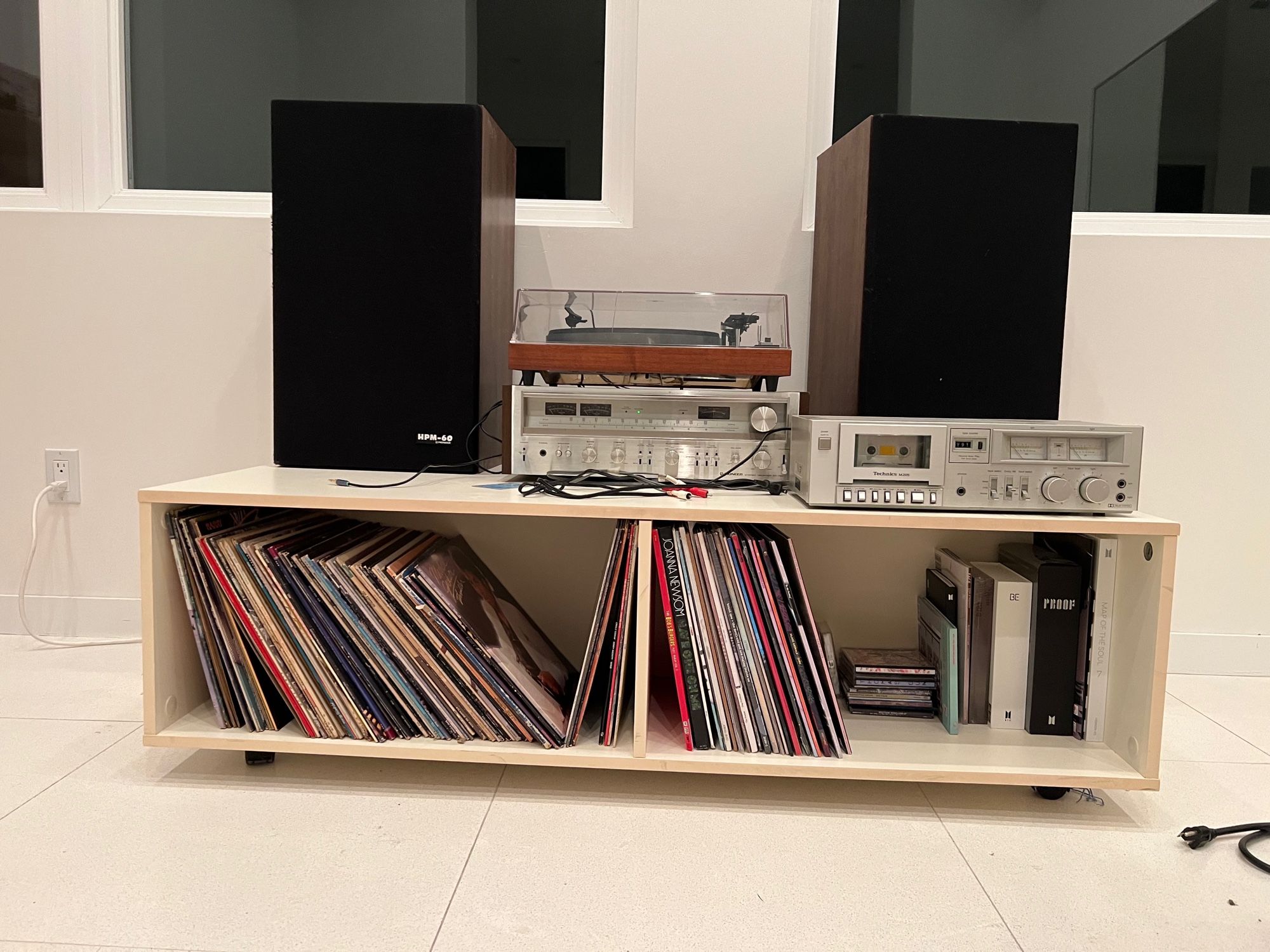 inherited records, record player, tape deck, and 70s wooden speakers