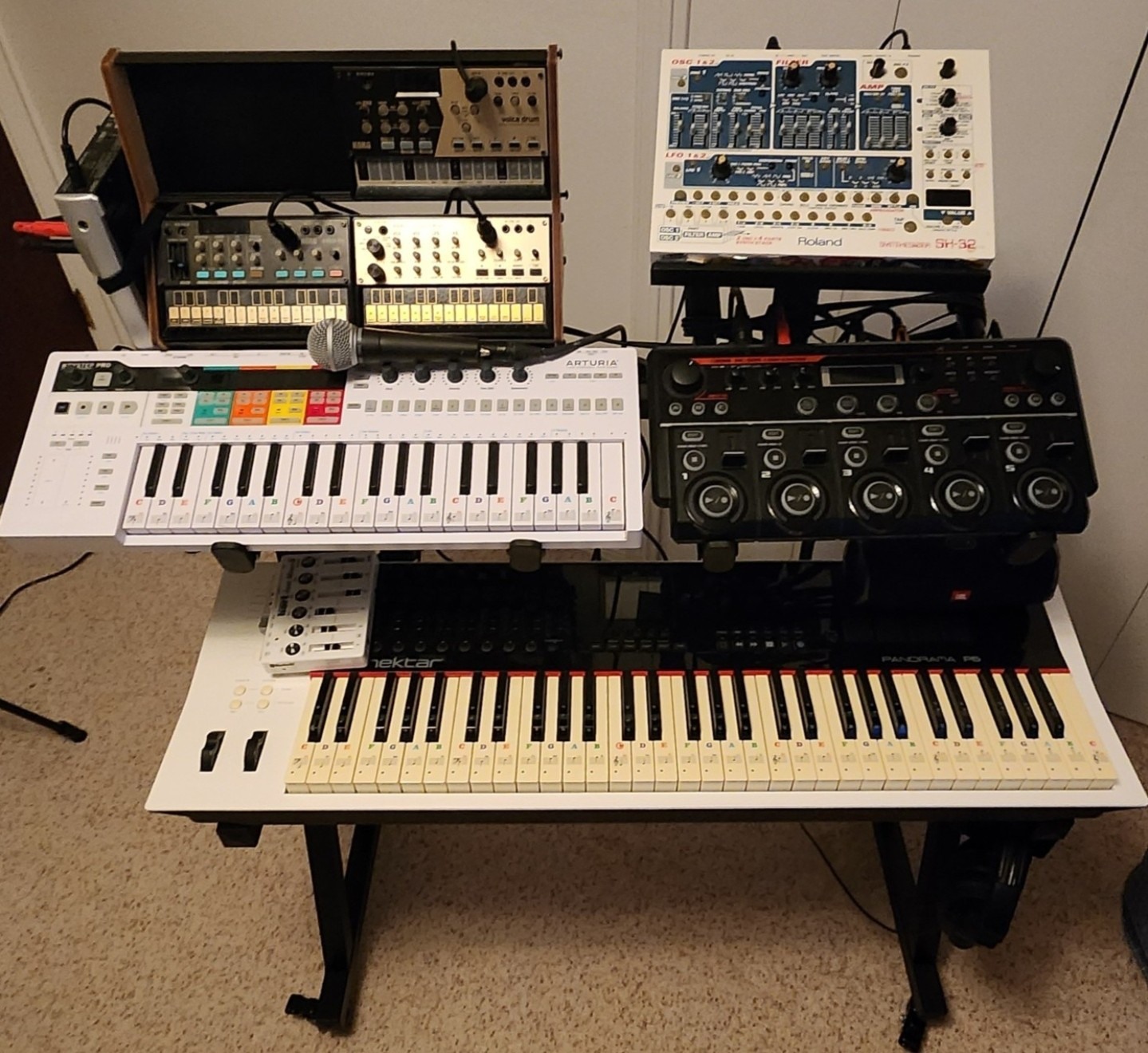 Nektar Panorama P6 Midi Controller, Arturia Keystep Pro Midi Controller. BOSS RC-505 Loopstation, Korg Volca FM, Korg Volca Keys, Korg Volca Drum, Maker Hart Bluetooth Just Mixer 5, Behringer Xenyx Q802USB Mixer, Shure SM58 Pro XLR, Luna Tattoo Concert Mahogany Ukulele, Sennheiser HD 280 PRO headphones, CME MIDI Thru5 WC, Liquid Stands Keyboard Stand w/ Wheels, Liquid Stands 2 Tier Keyboard (X2),