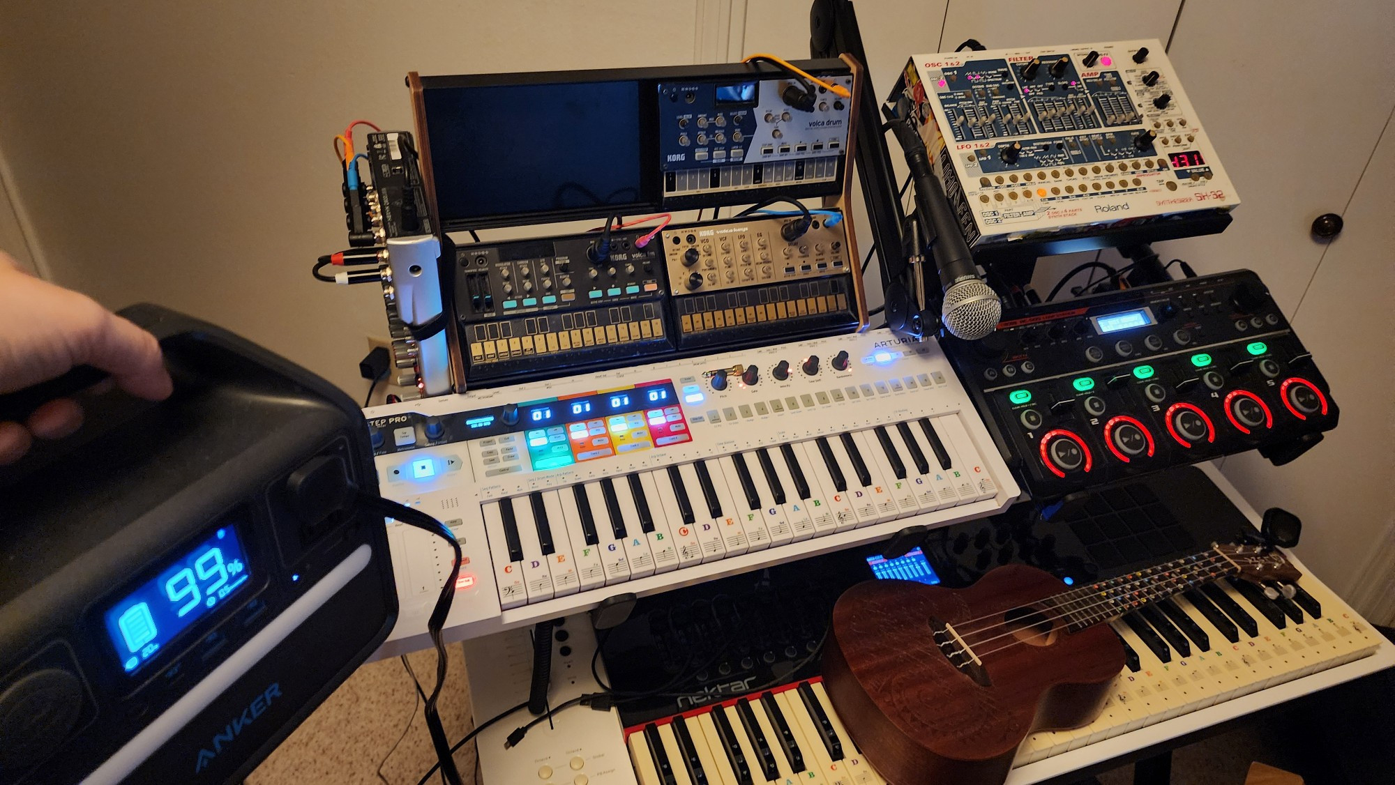 Nektar Panorama P6 Midi Controller, Arturia Keystep Pro Midi Controller. BOSS RC-505 Loopstation, Korg Volca FM, Korg Volca Keys, Korg Volca Drum, Behringer Xenyx Q802USB Mixer, Shure SM58 Pro XLR, Luna Tattoo Concert Mahogany Ukulele, Sennheiser HD 280 PRO headphones, CME MIDI Thru5 WC, Liquid Stands Keyboard Stand w/ Wheels, Liquid Stands 2 Tier Keyboard (X2)

all powered by portable Anker 521 Power Bank