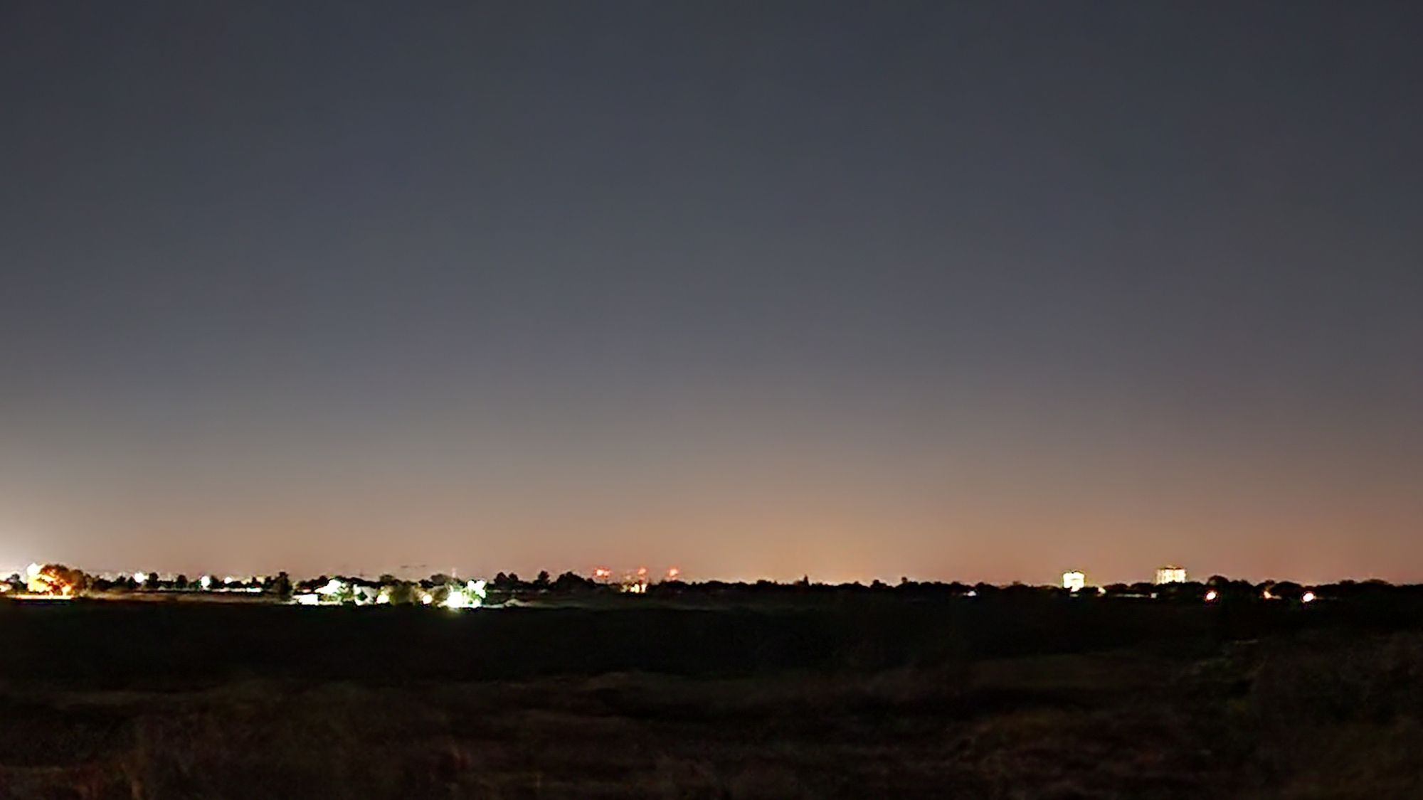 a WAY TOO BRIGHT cityscape photo of light pollution