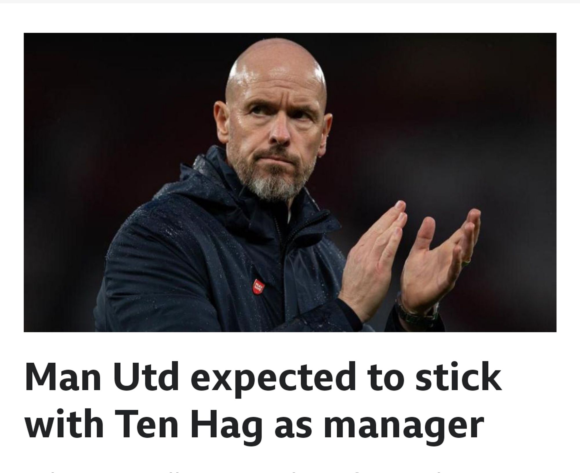 A very shiny headed white man with a grey beard looks hunched and grumpy but it is clapping. He's wearing a navy jacket. It's Eric ten Hag. 

The headline reads "Man Utd expected to stick with Ten Hag as manager"