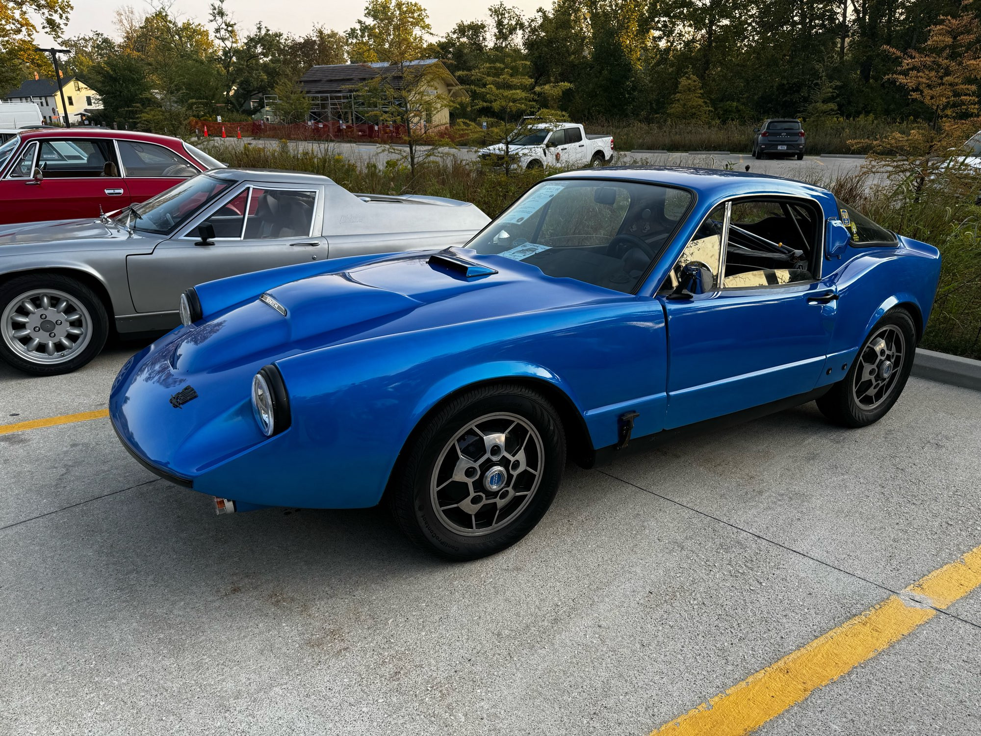 A blue Saab Sonnet in profile.