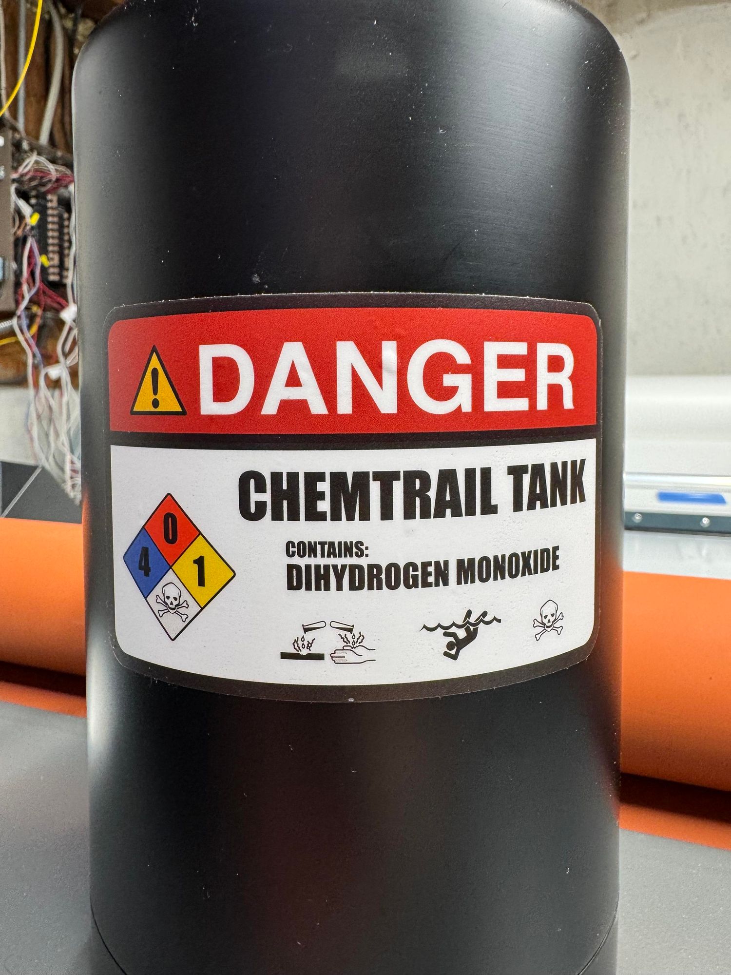 Dangerous central tank sticker on water bottle