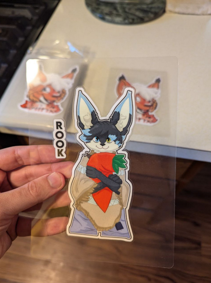 A finished, perfectly cut, printed, and laminated badge!