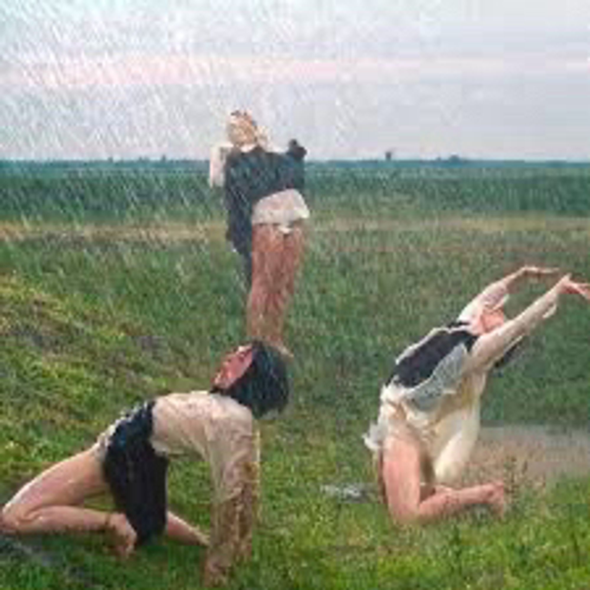 3 women in traditional Balkan dress, sublimating some desire or other to the shattering, cleansing rain by bearing their crotches to the Gods. I think that’s what’s happening anyway