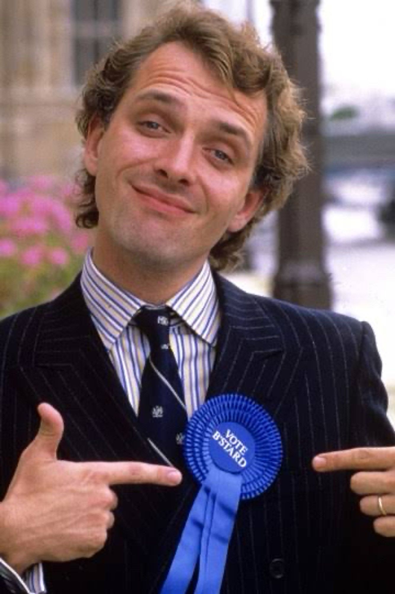 Rik Mayall as Alan B'Stard