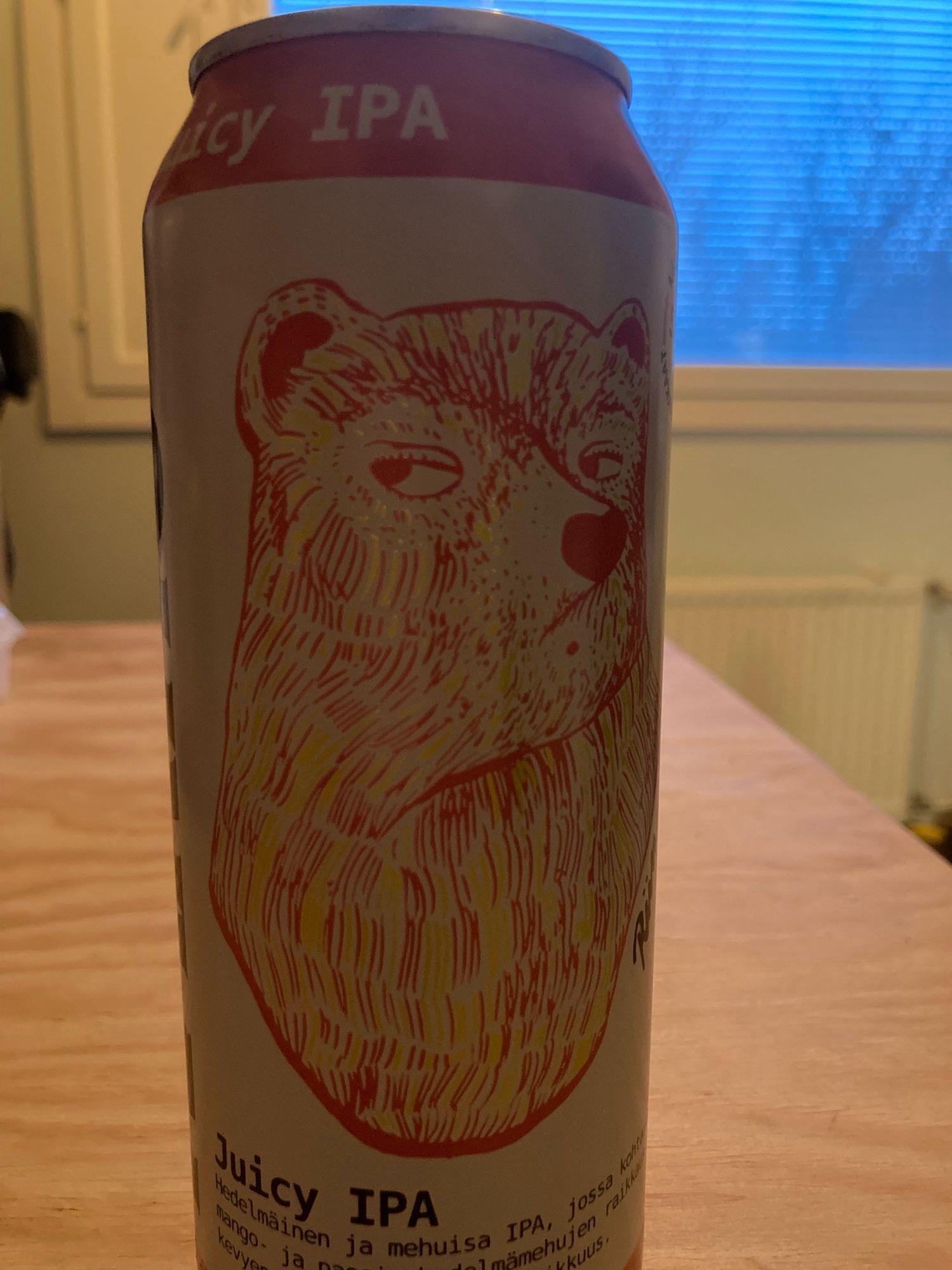 Beer can where is a art picture of sassy bear.