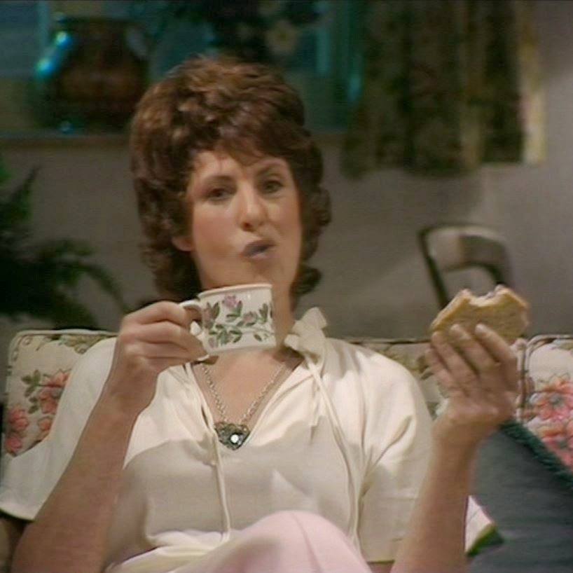 Vivien Fay relishing a decent cuppa and a sausage sarnie on her way to steal your segment of the Key to Time in 1978's Doctor Who: "The Stones of Blood".