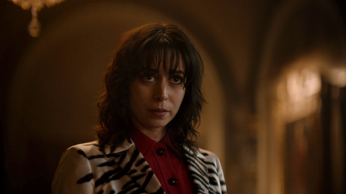 Cristina Milioti as Sofia Falcone, in long white zebra striped coat.