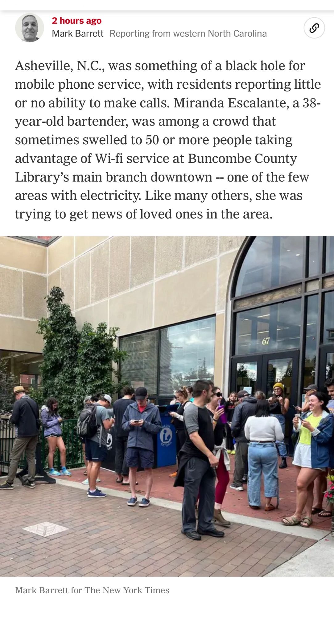 Screenshot of article describing a crowd in Asheville, NC, gathered outside a library providing WiFi