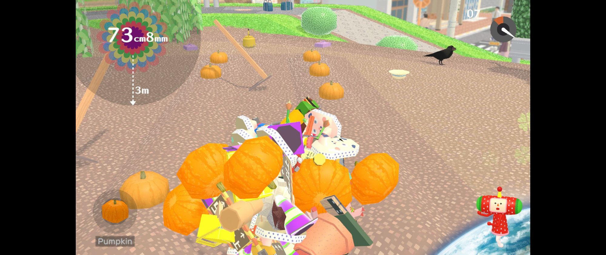 Screenshot of the game We Love Katamari where the objective is to roll up objects on a ball, the ball in question is filled with pumpkins