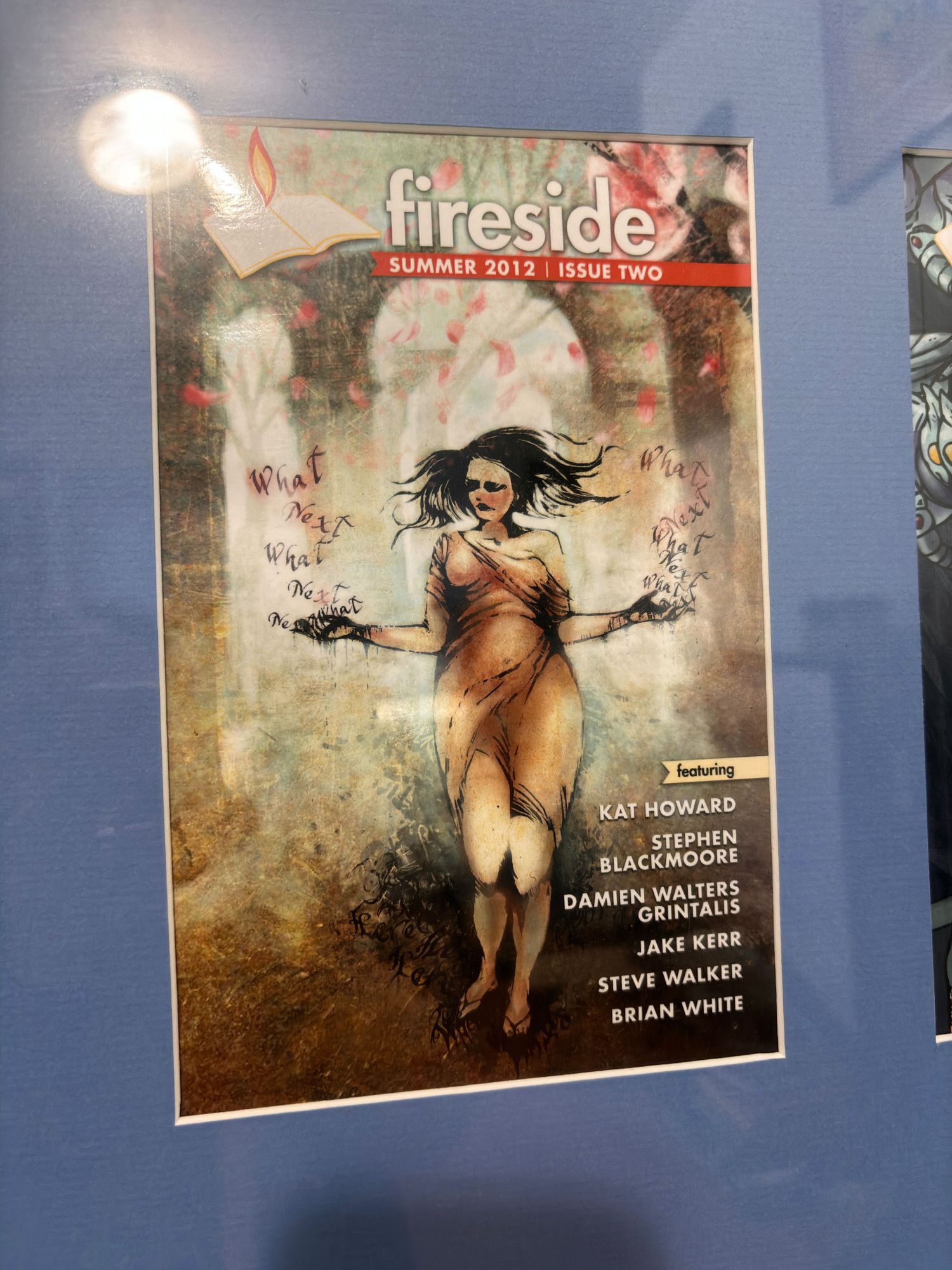 photo of the cover of Fireside's second issue, from Summer 2012. The contributors listed are Kat Howard, Stephen Blackmoore, Damien Walters Grintalis, Jake Kerr, Steve Walker, and me. The cover illustration is all in warm browns with some reds and oranges, of a woman in a rough dress, arms spread, the words "what next" rising repeatedly from her hands.