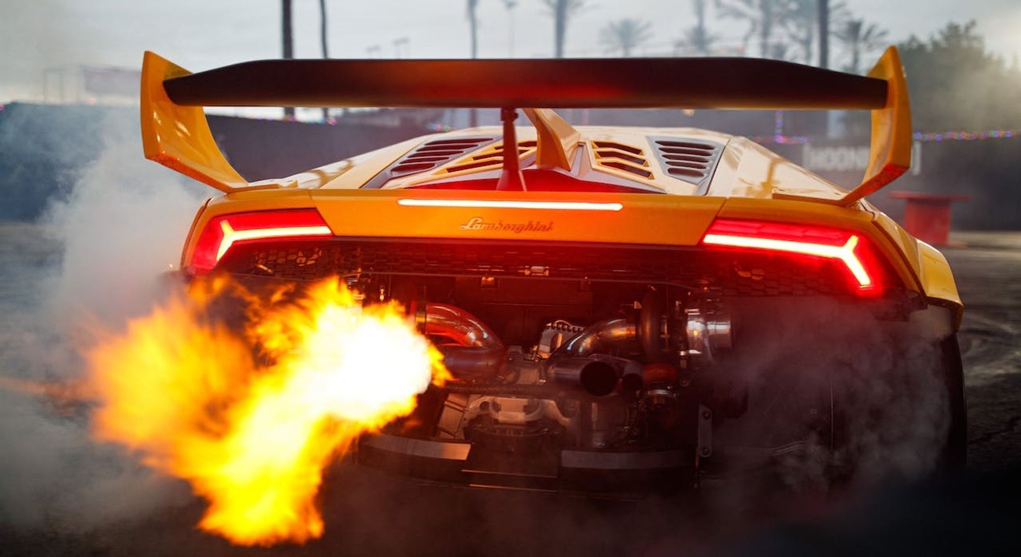 Flames coming from a lamborghini engine in support of storytelling in sales book