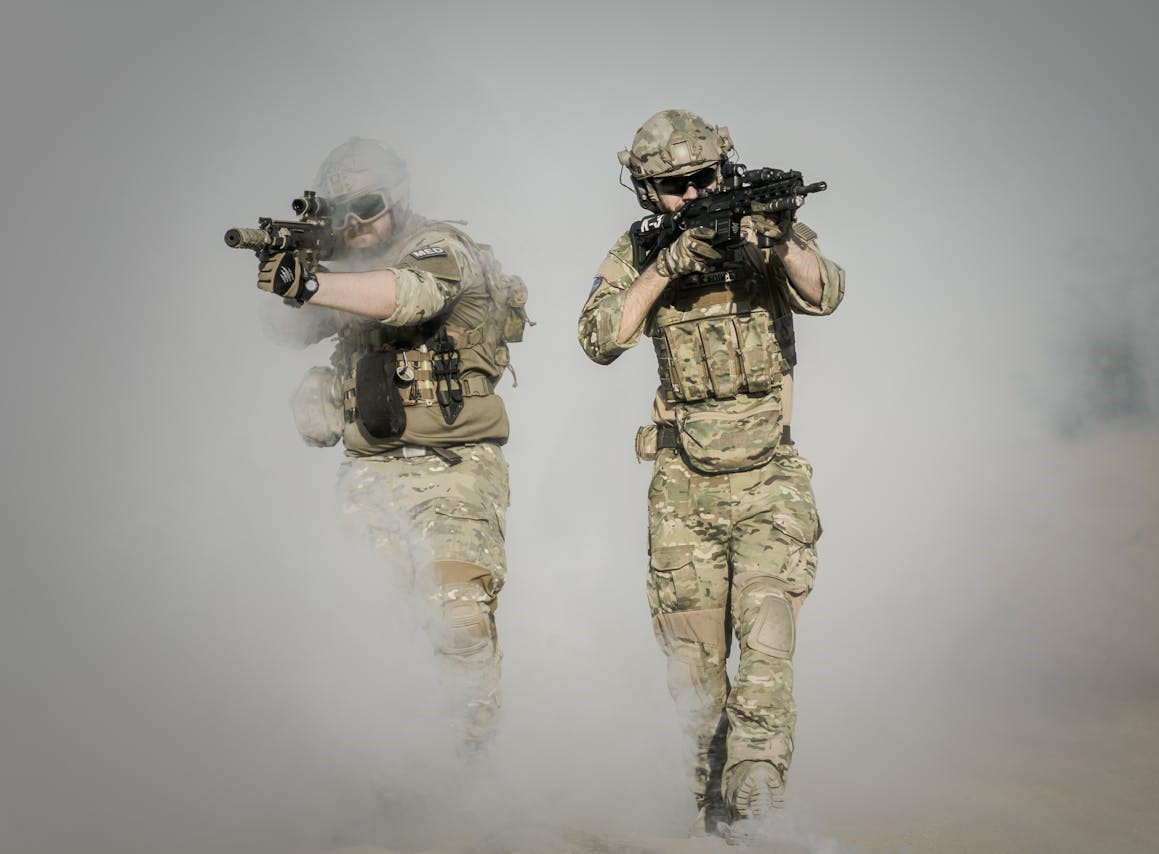 On point publishing's chosen image of two soldiers emerging from smoke with their rifles poised