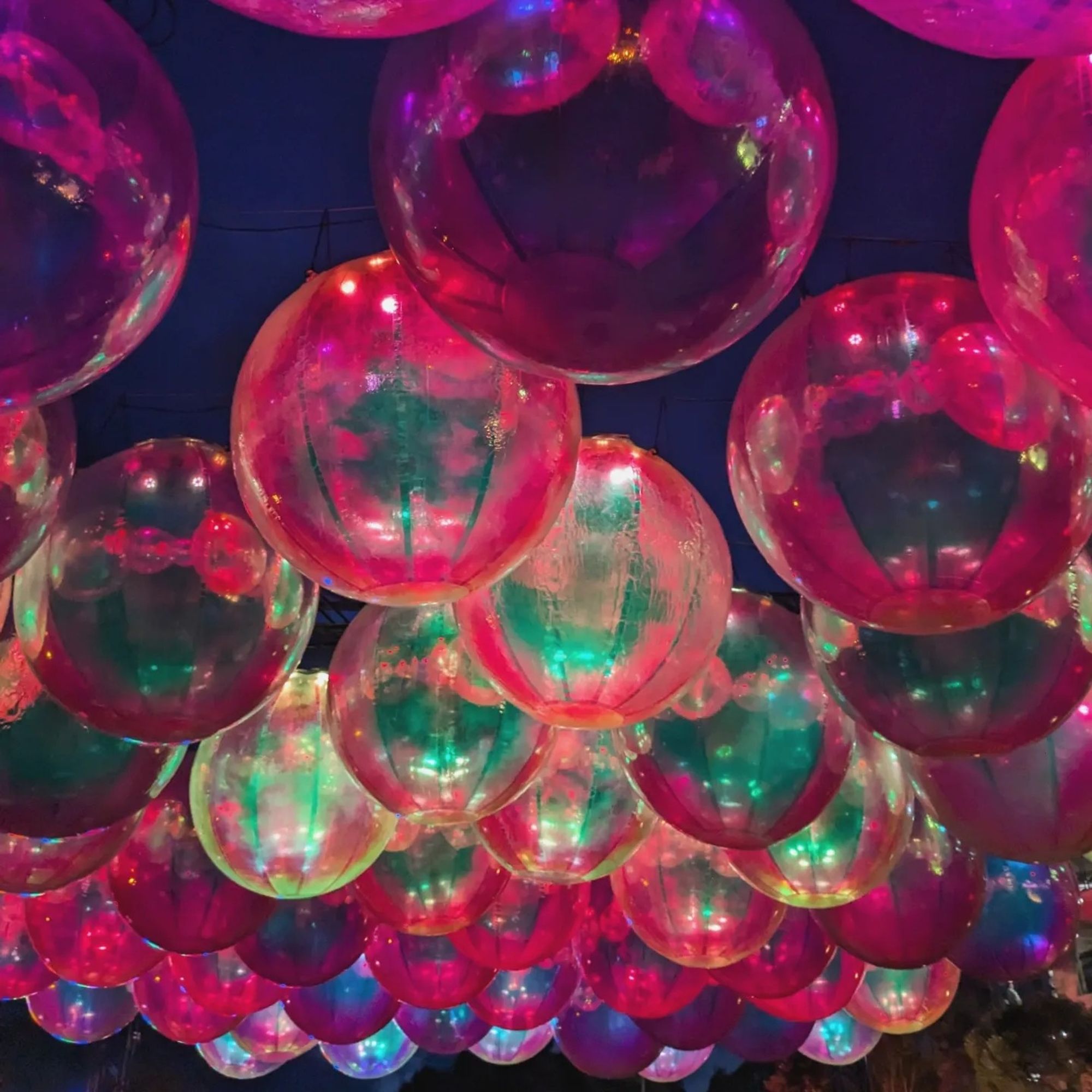 A light display of large, inflatable, iridescent balls.