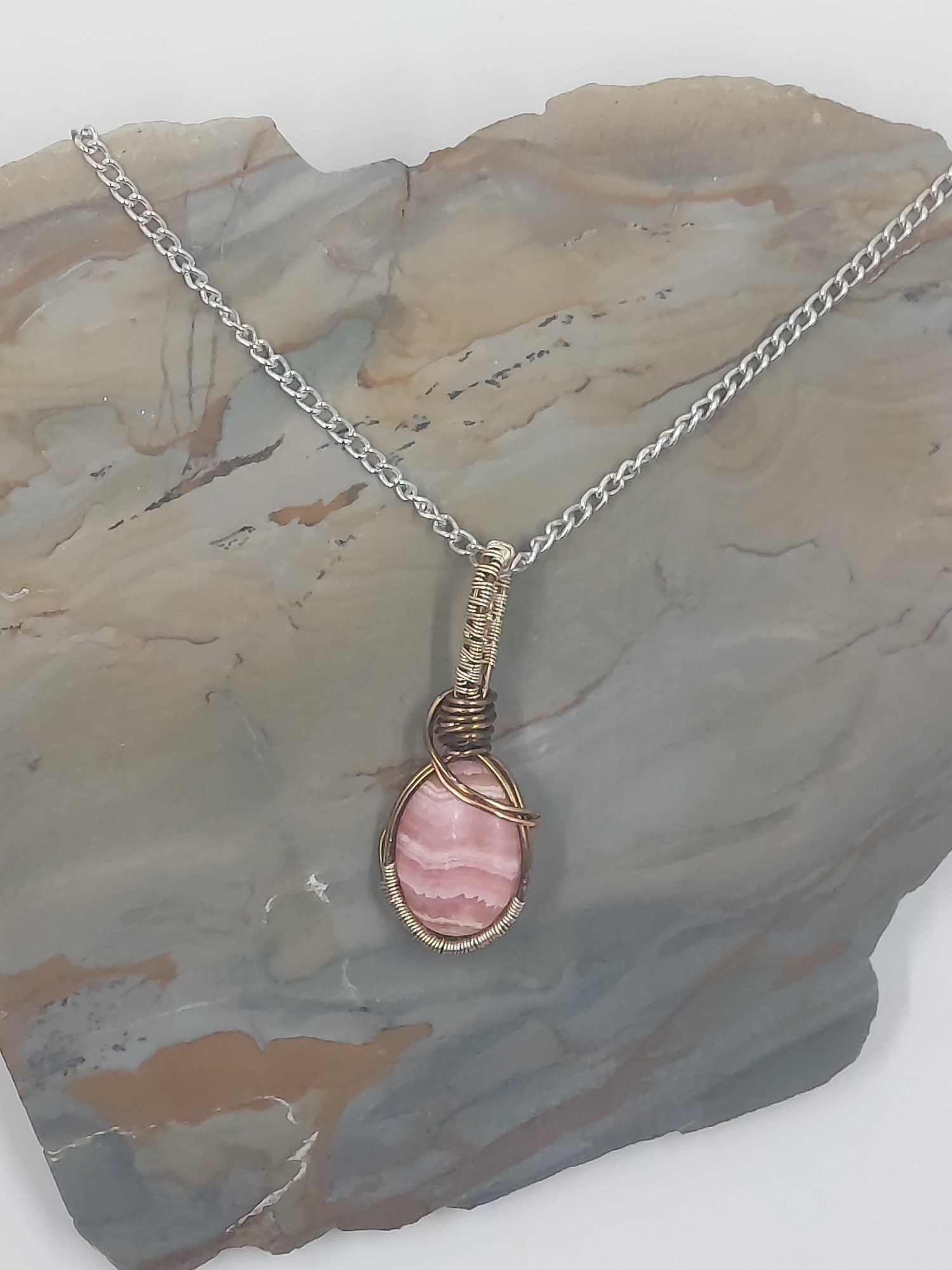 Rhodochrosite pendant, which I cut and wrapped. From Argentina.