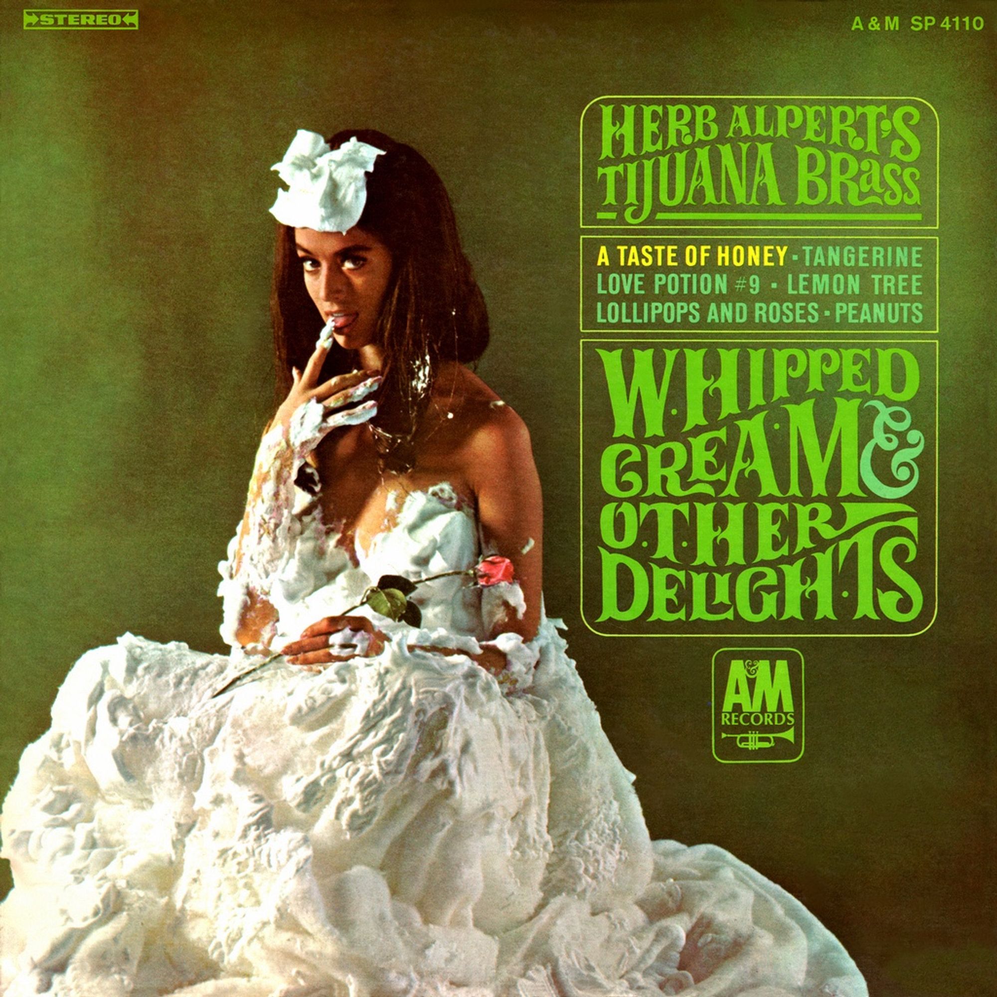 Herb Alpert’s Tijuana Brass Whipped Cream and other Delights. A woman encased in whipped cream with her finger on her lips.