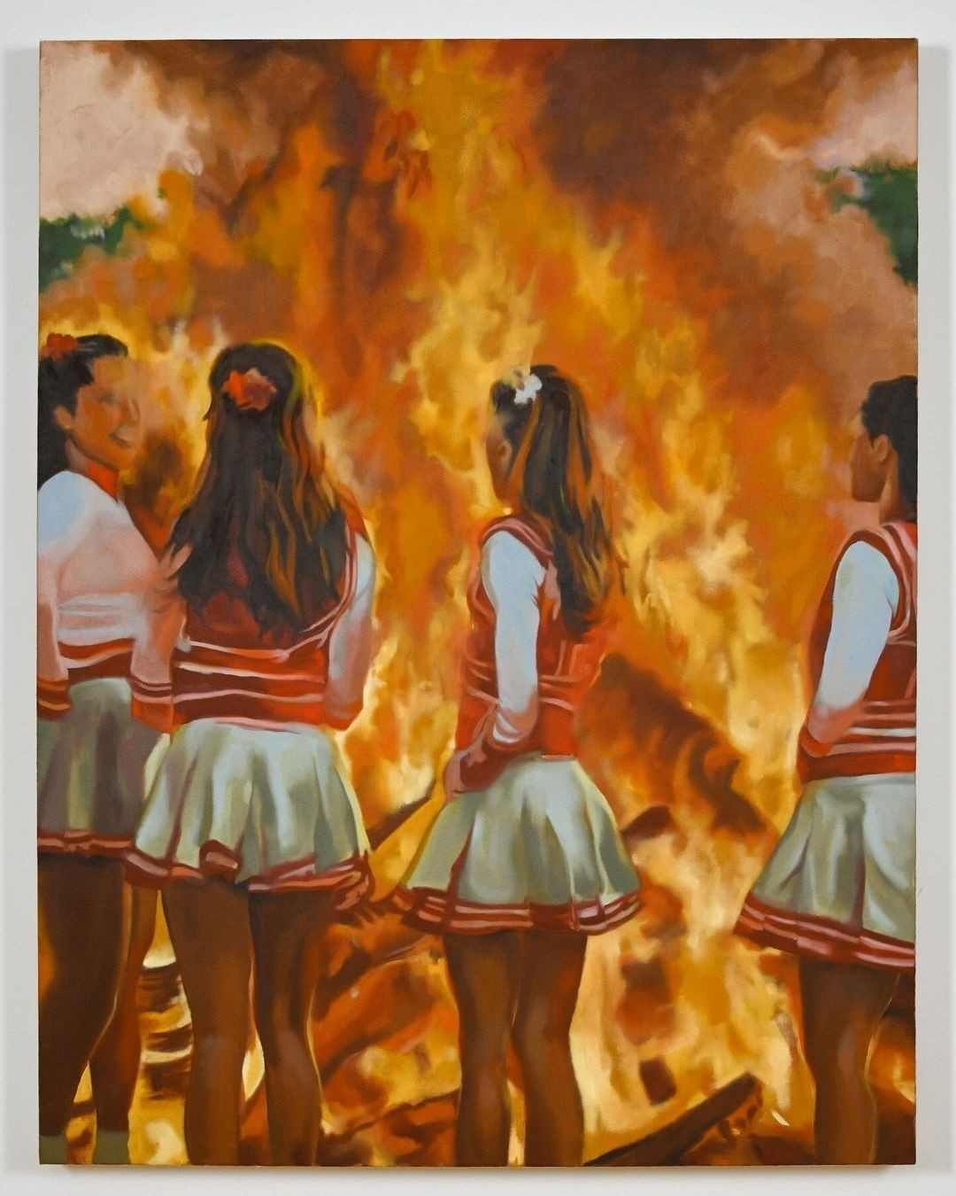 Painting of four cheerleaders standing in front of a bonfire. Pep rally as apocalypse