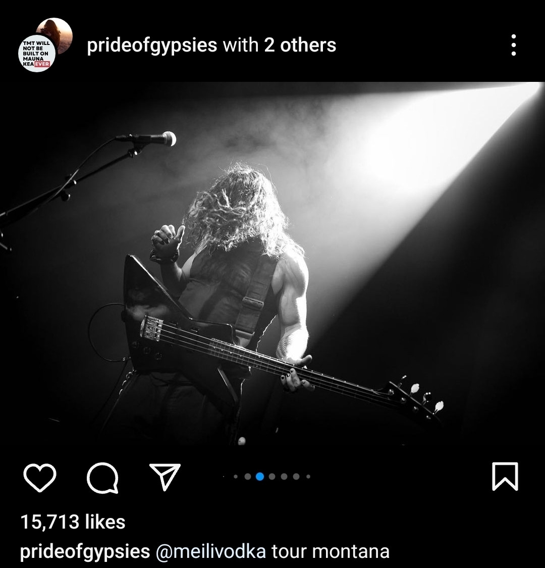 pride of gypsies with 2 others 

Momoa on stage, single spotlight. His hair covers his downcast face, his bicep ripples above the guitar fret.

@meilivodka tour montana