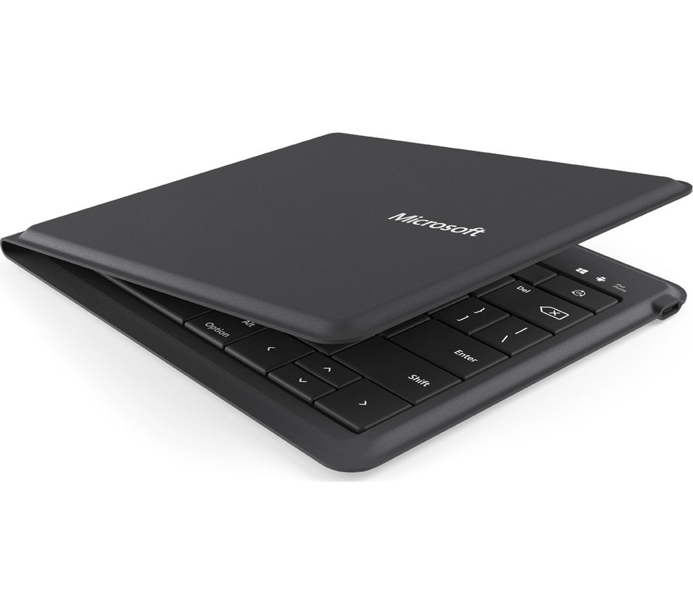 Microsoft Universal Foldable Keyboard, a dark gray, rectangular object, shown slightly unfolded in a V shape. The name Microsoft is printed on the upper surface, and inside our visible a few keys of a QWERTY keyboard. The image is a product photo, with the item sitting or floating in an otherwise featureless white space.