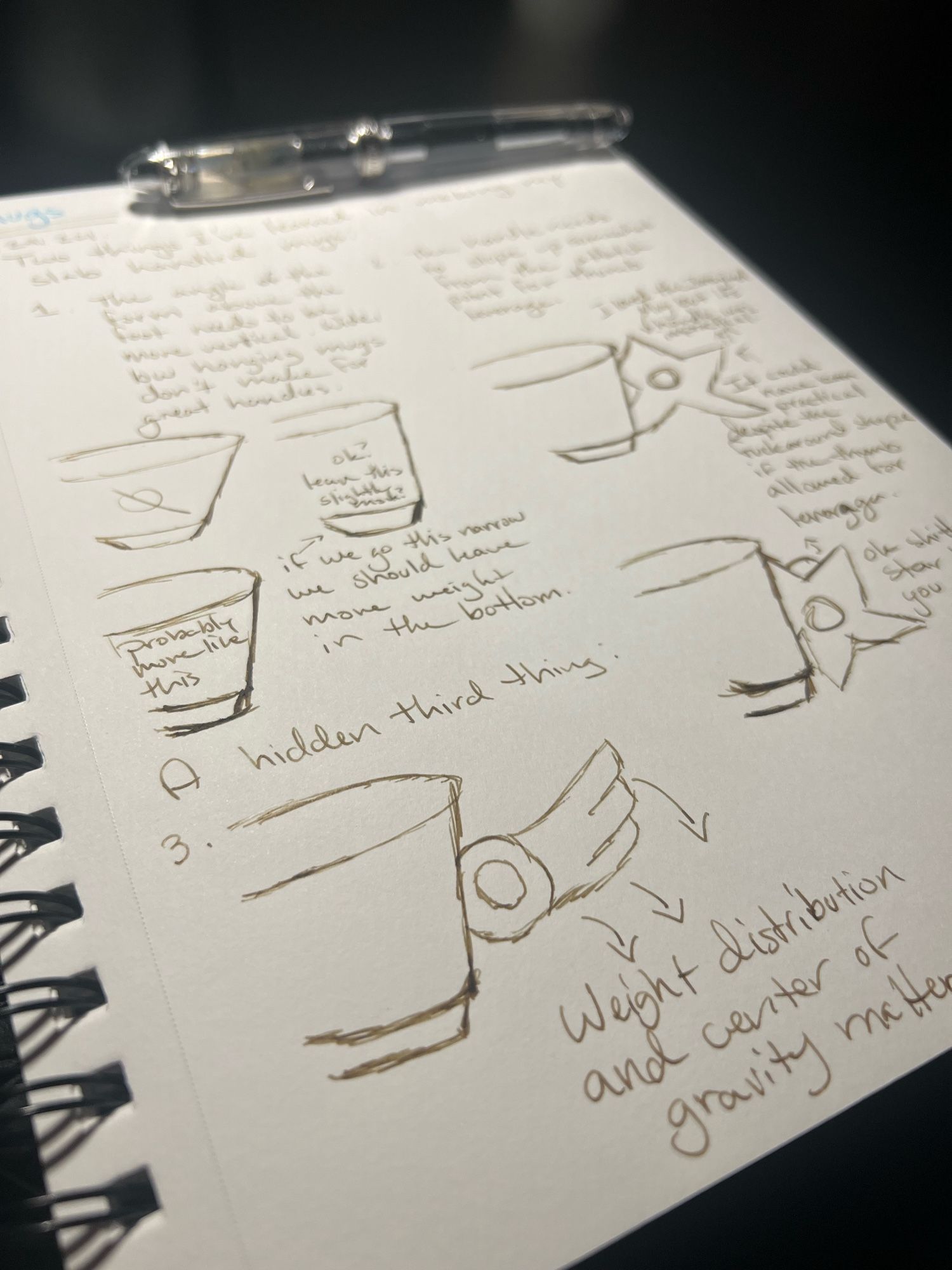 my sketchbook where i went over some mug design features i’ve been needing to write down for study purposes