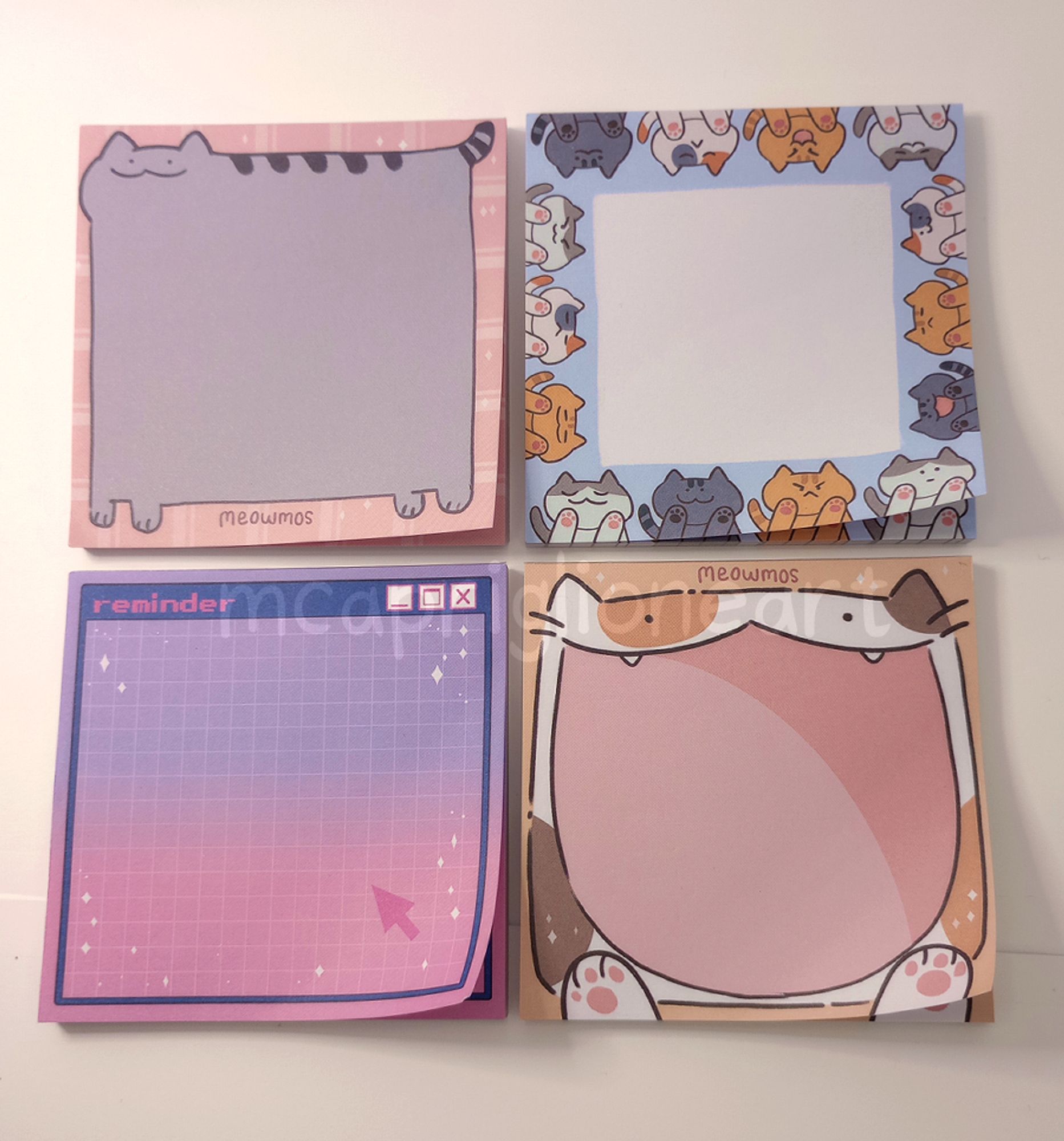 preview image of four memo pads in four different designs