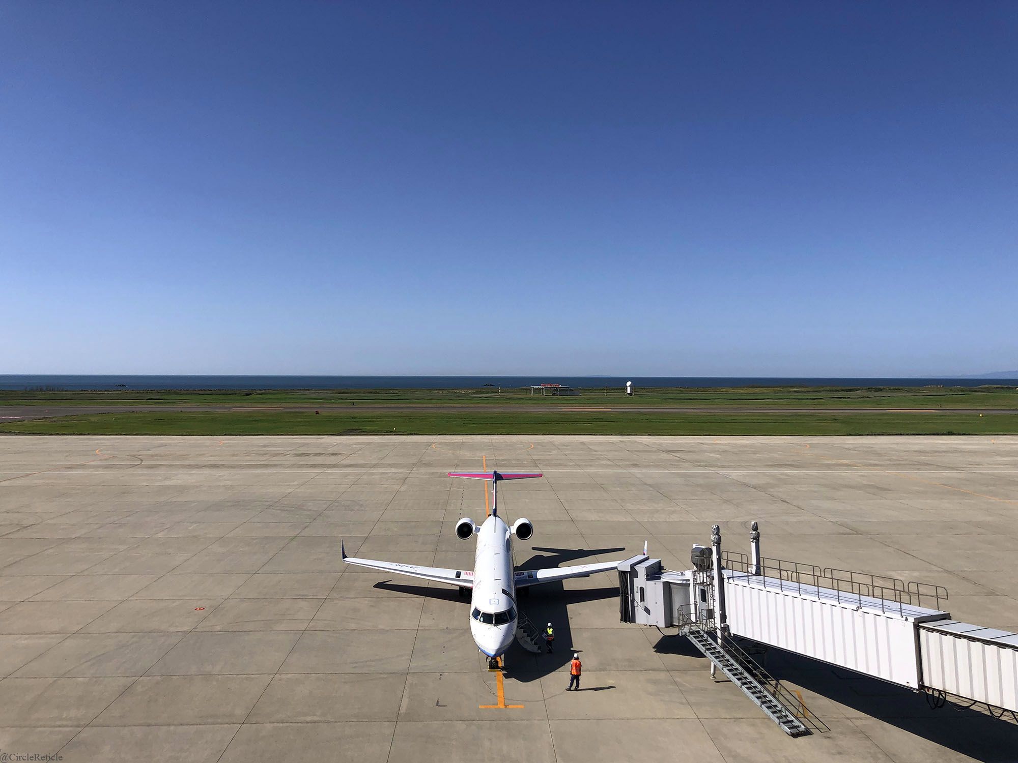 Looking down a regional jet CRJ700 preparing for takeoff