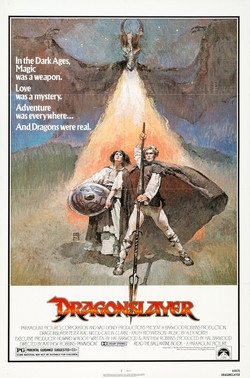 The cinema poster for 1981s Draginslayer. A cheesy image of a dragon breathing fire on a guy with a staff and someone with a shield. Looks a bit like it was drawn in art class. No, cheesier than that.