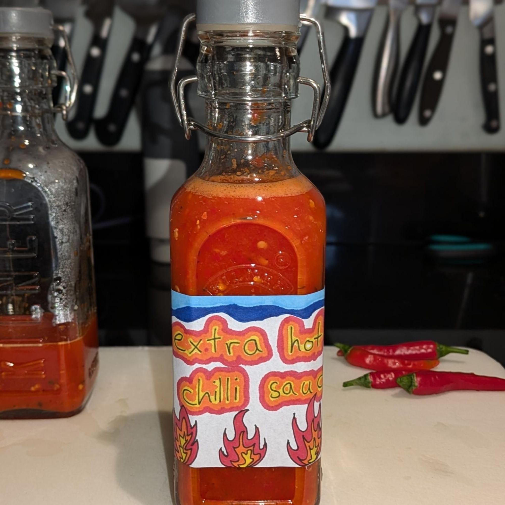 Finished bottle of chili sauce with homemade label.