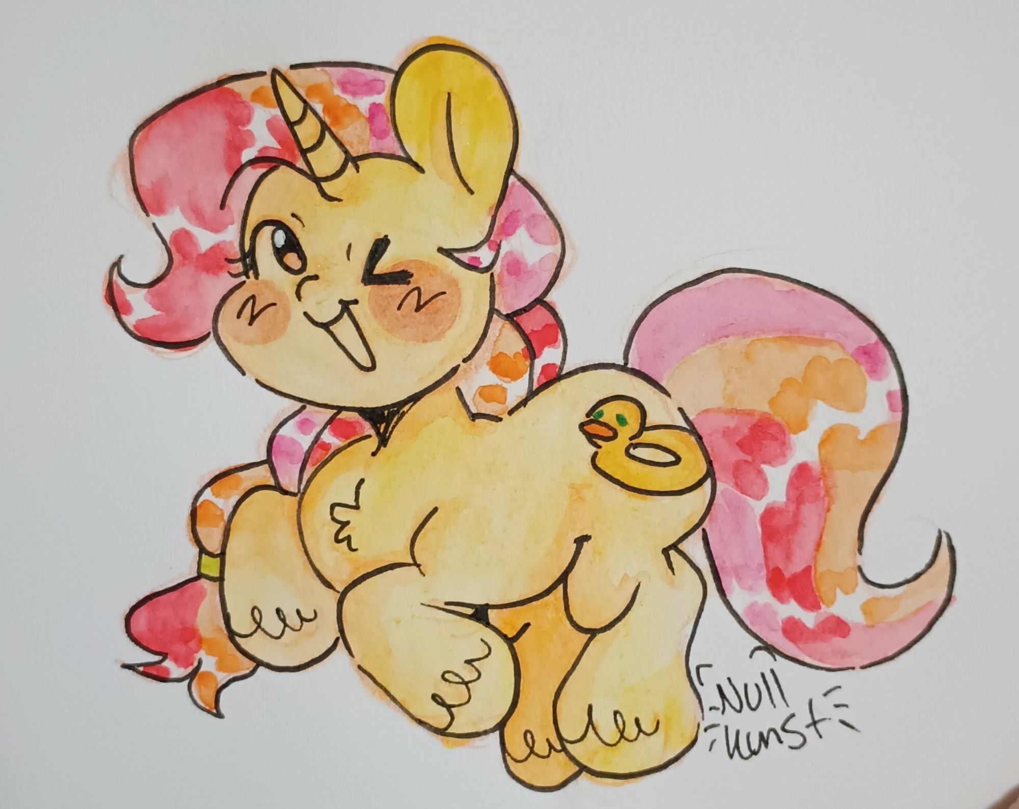 A Chibi drawing of a yellow-orange unicorn with a pink/orange/red mane and tail. Done in watercolor. End description.