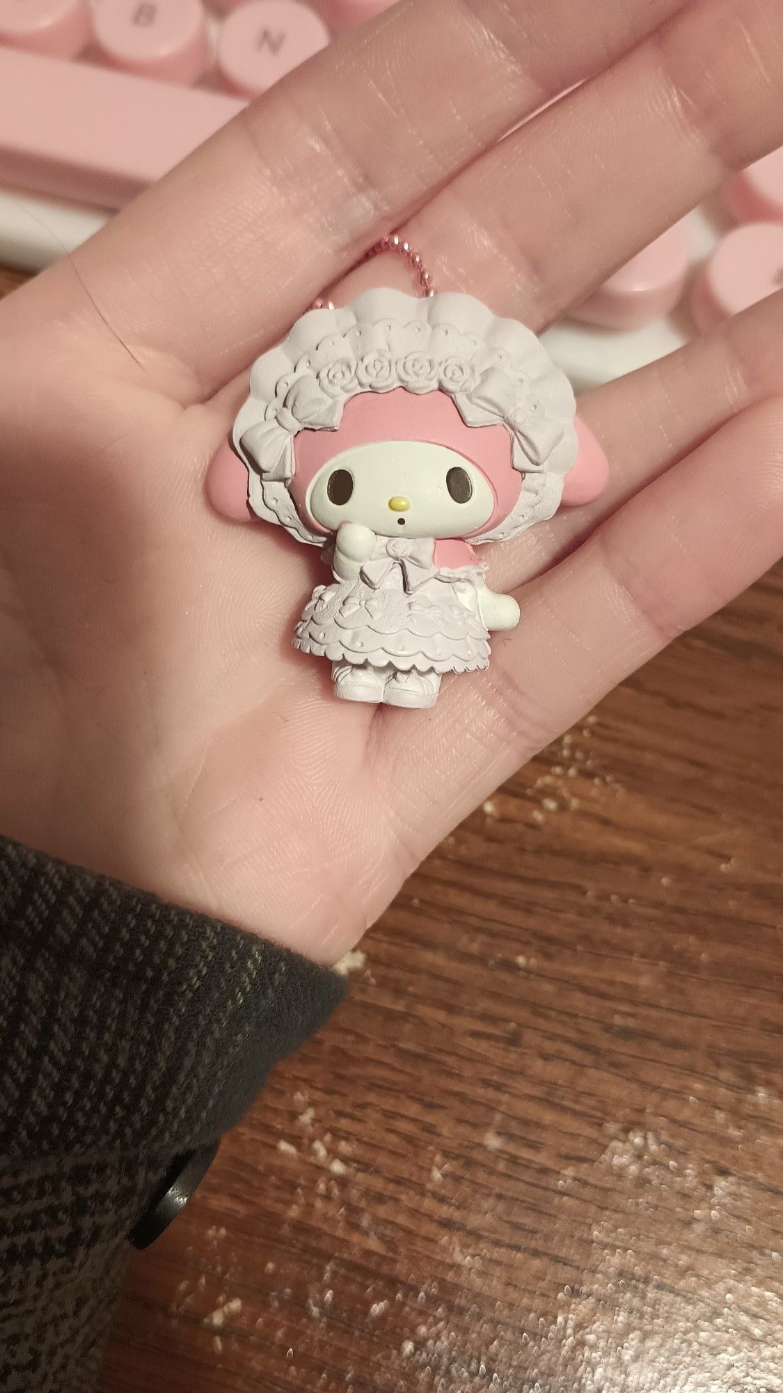 An image of a keychain of the sanrio character My Melody, in a purple lolita style dress and bonnet. End description.