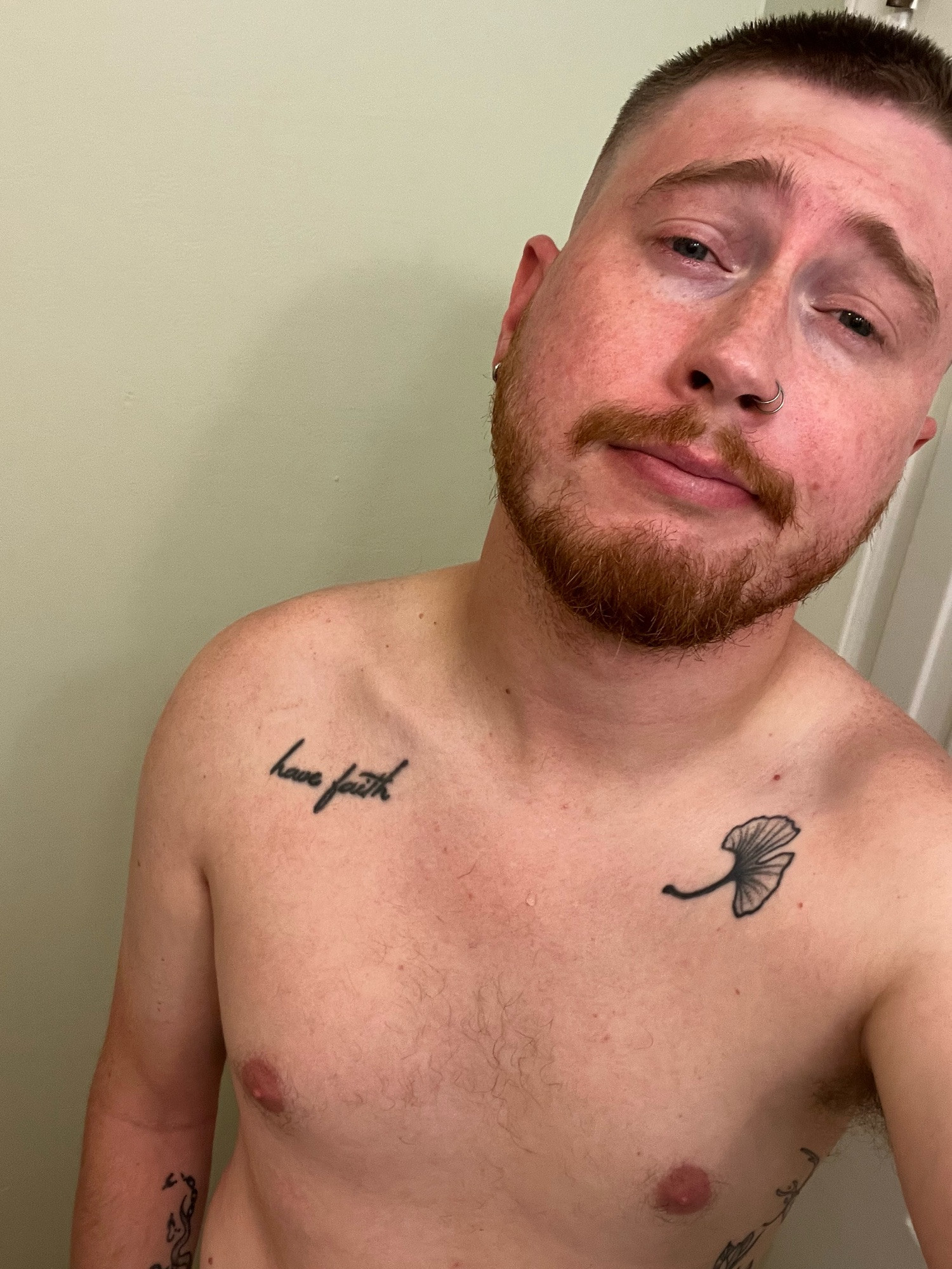 Shirtless selfie after a shower featuring a fresh  buzz cut.