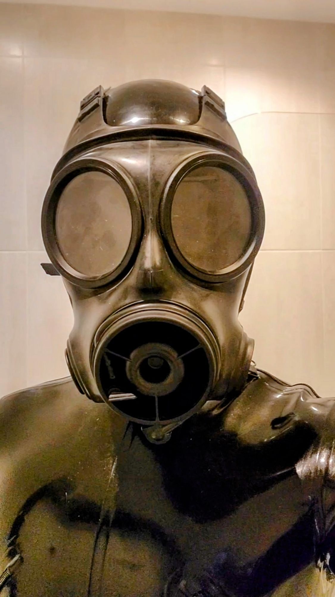 Rubber drone in gas mask