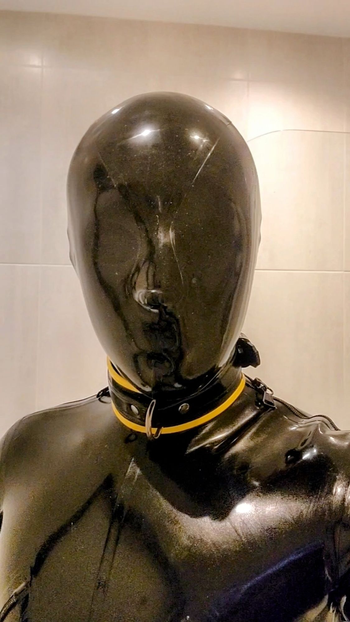 ... to reveal the gimp beneath...