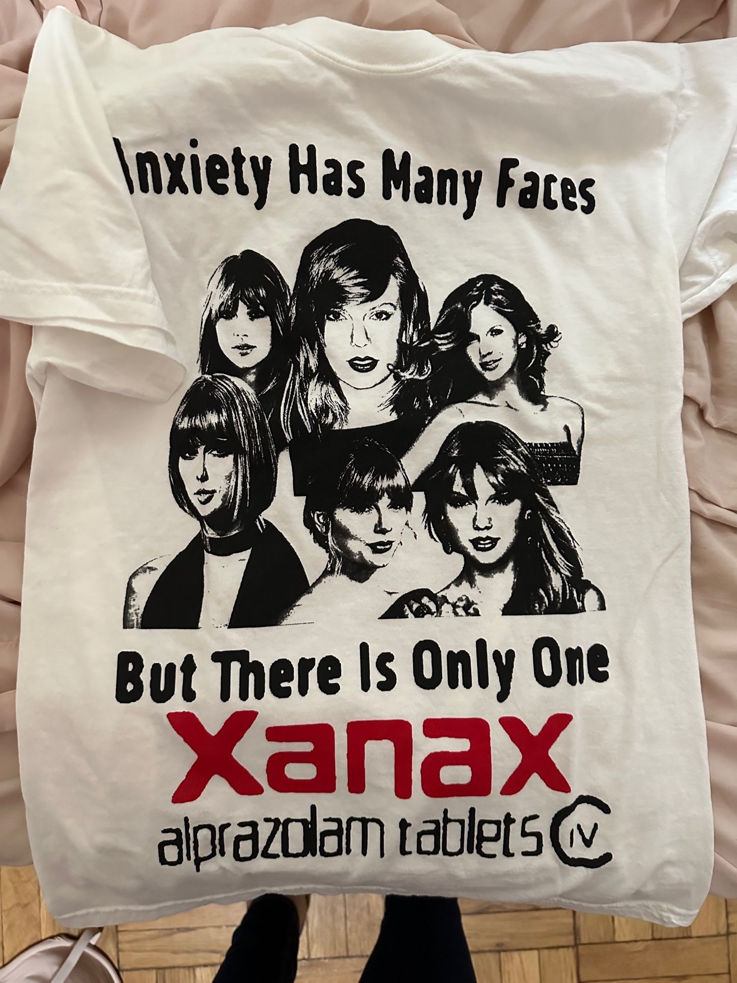 t shirt that reads "anxiety has many faces but there is only one xanax"