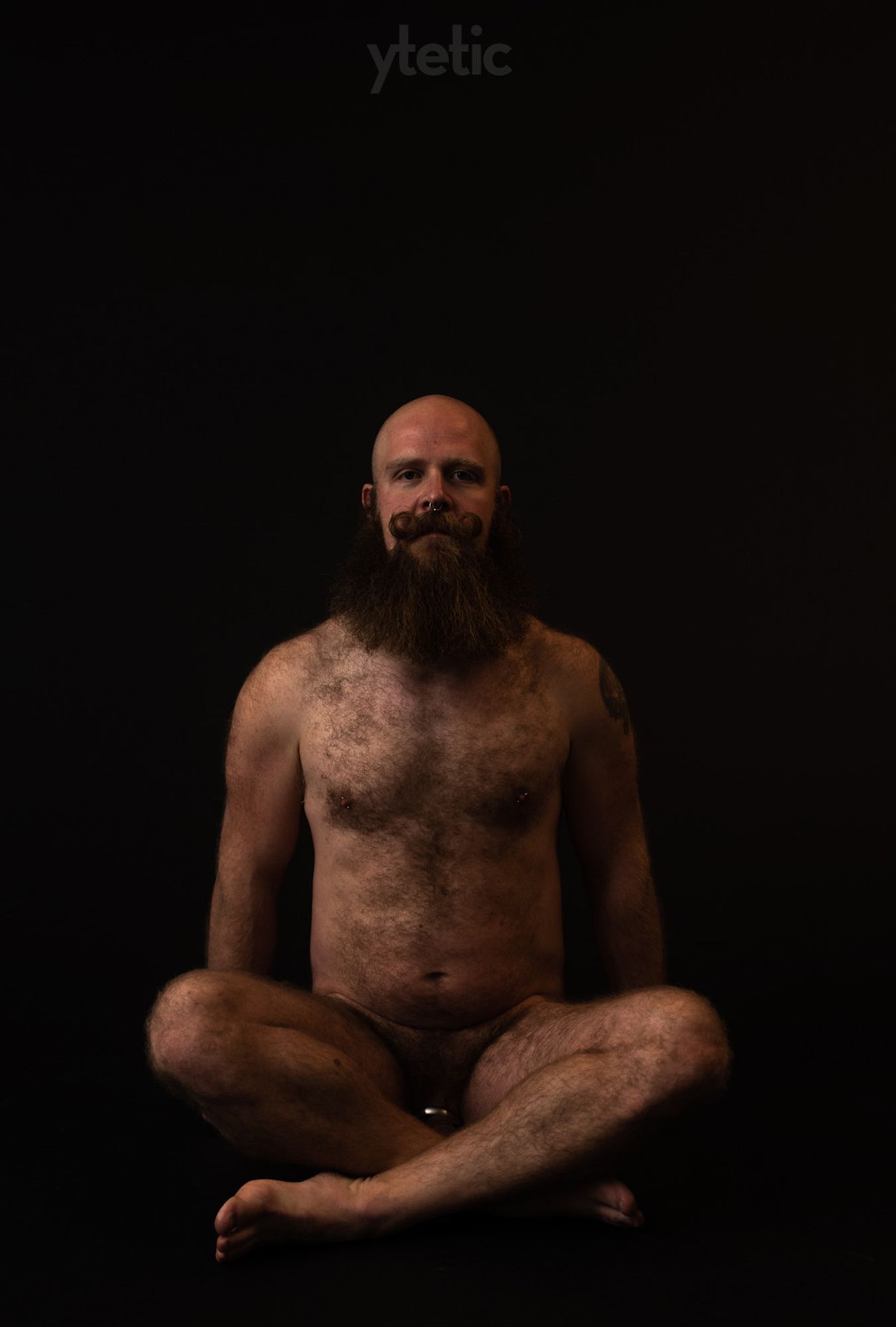 4. Sitting on ground, nude, cross legged, supporting himself on hands behind him.