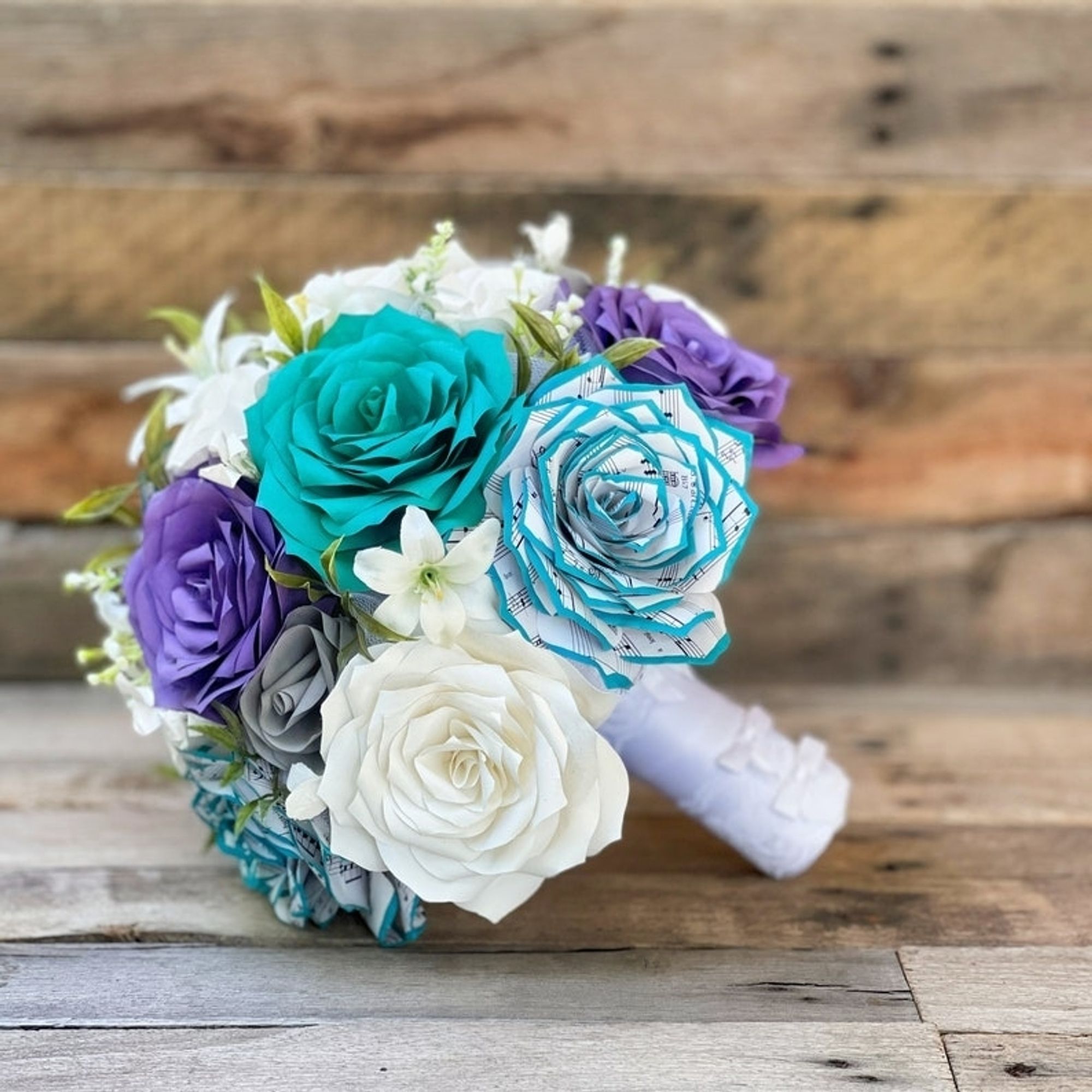 Purple teal white roses bouquet