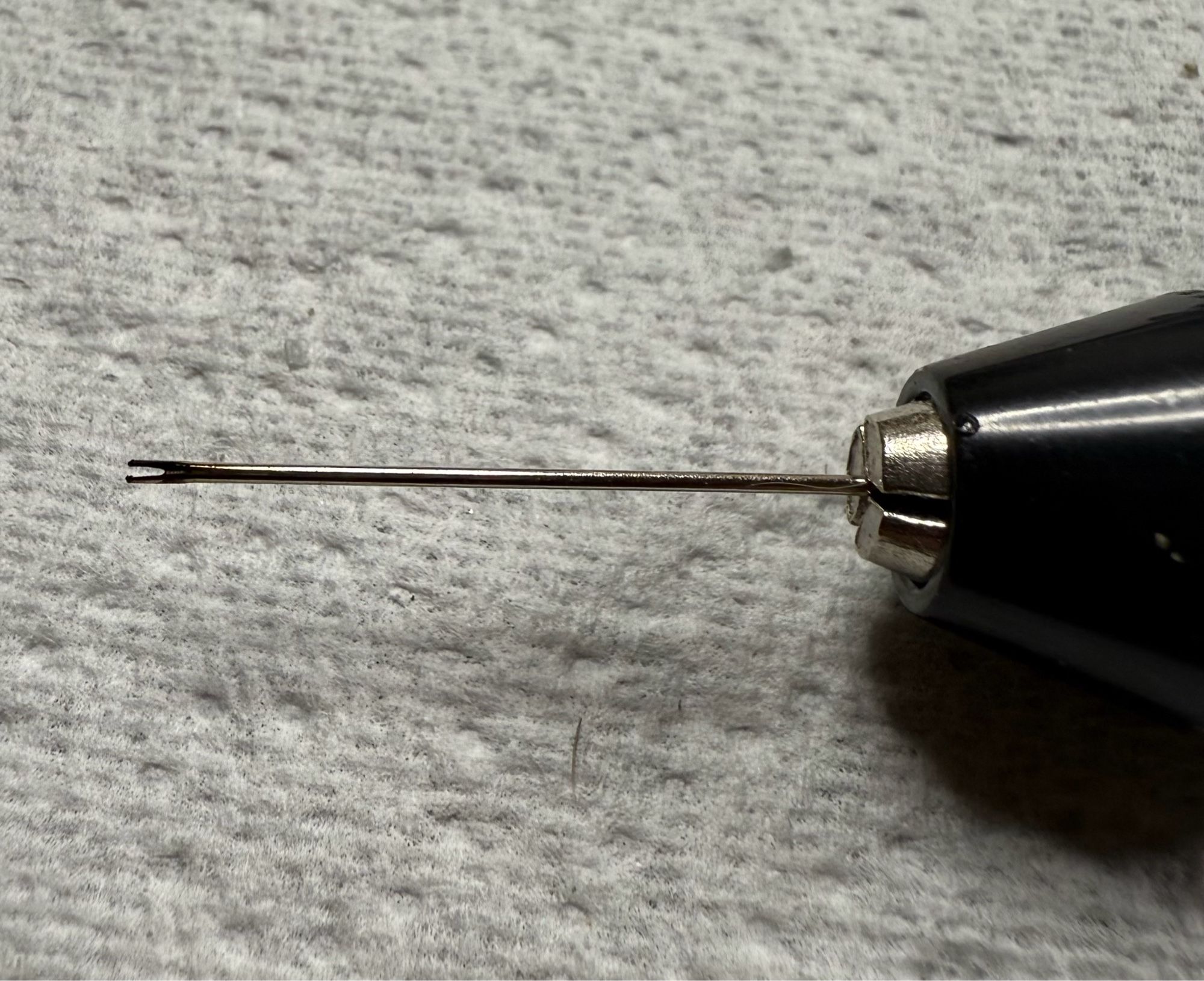 Modified sewing needle as a CA glue applicator.