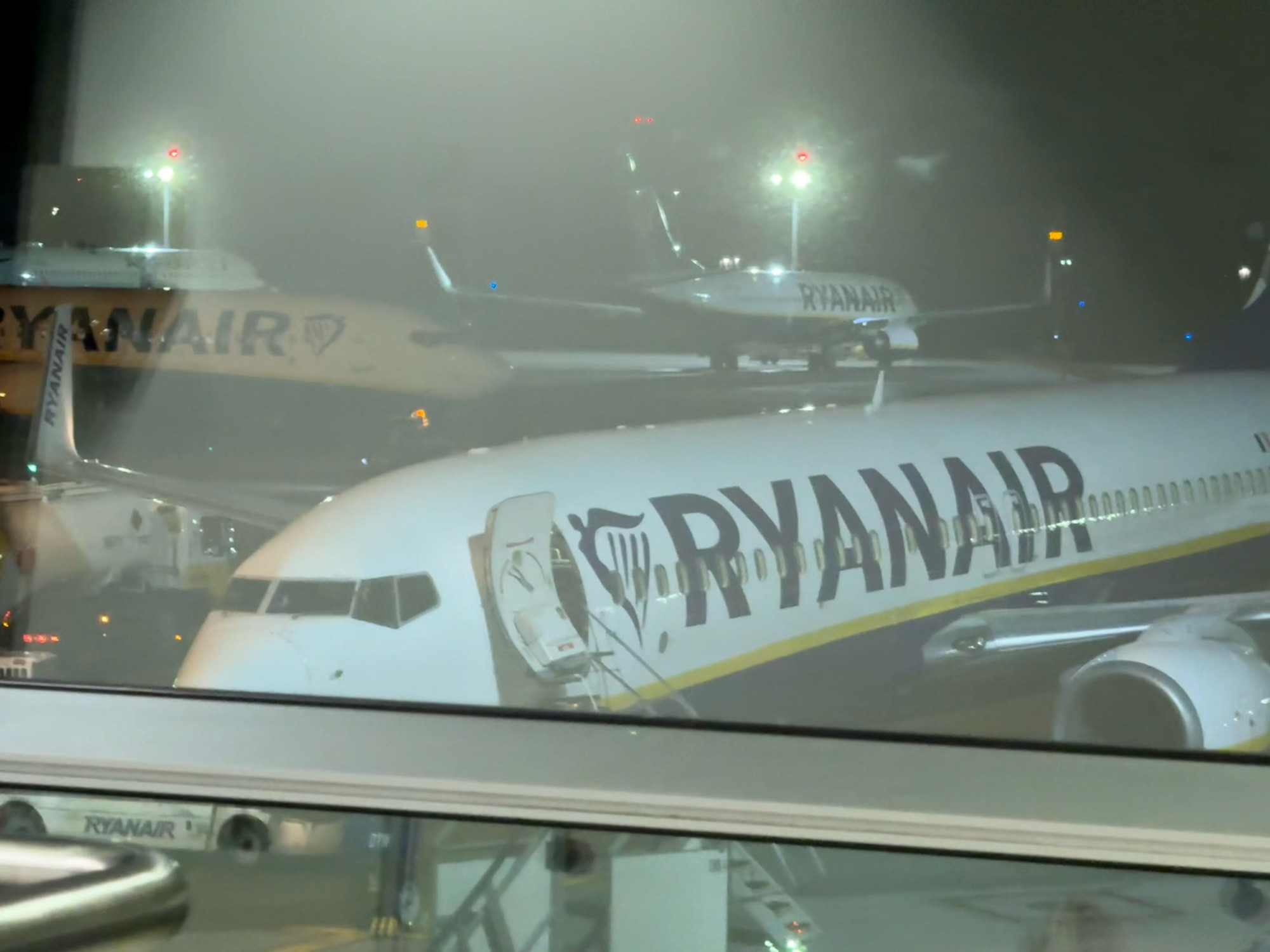 a Boeing 737-800 with Ryanair branding, photographed from Dublin Airport Terminal 1